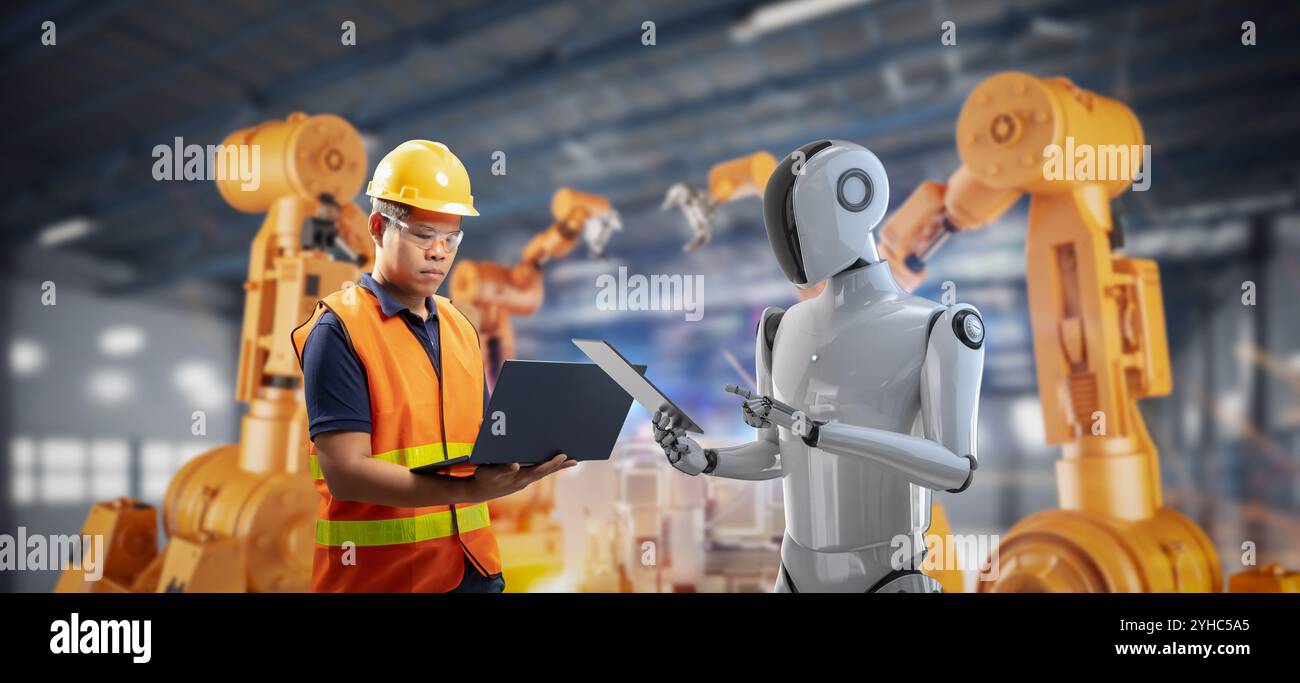 Automation industry concept with engineer control robot assembly line in factory Stock Photo