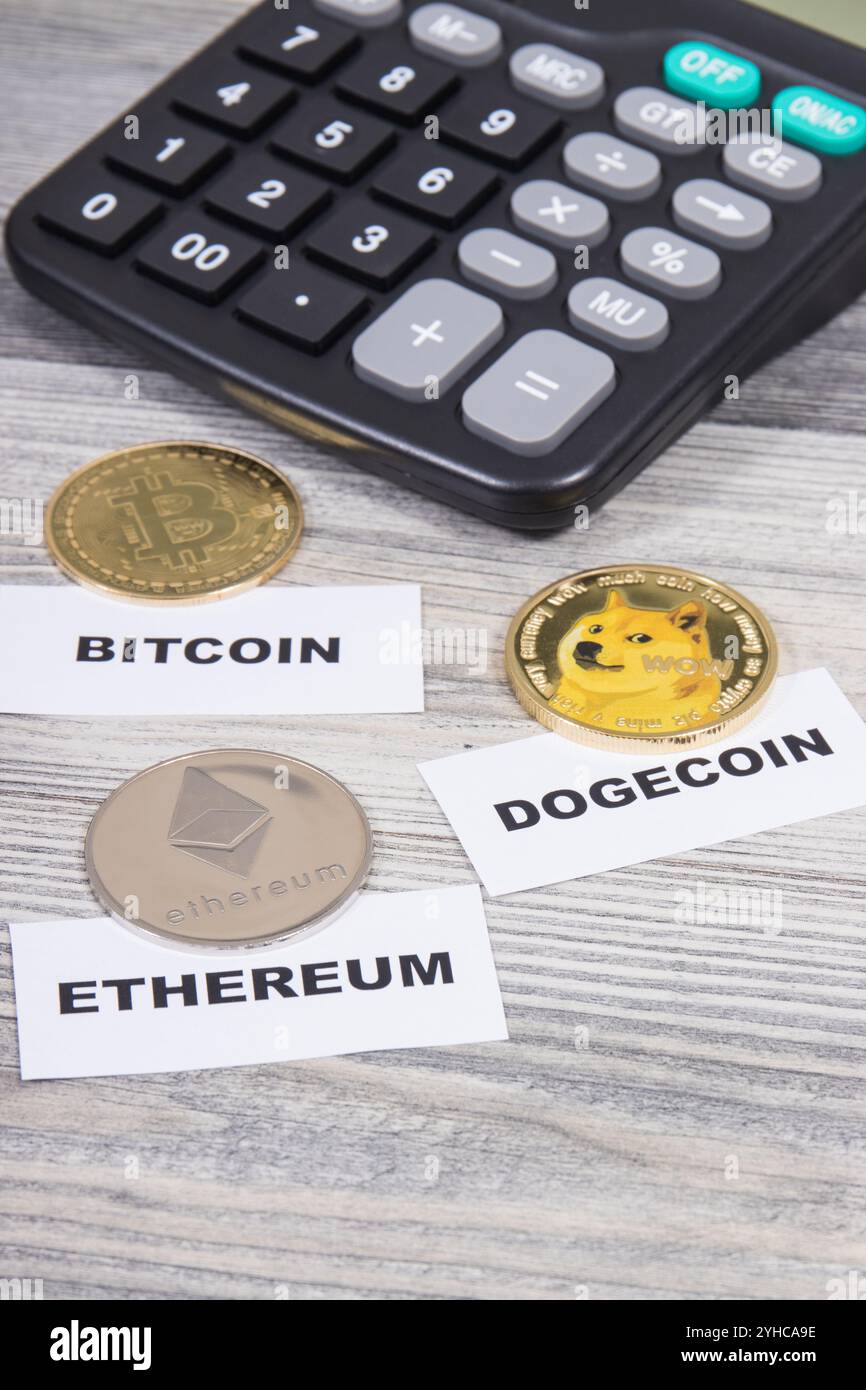 Bitcoin, ethereum, dogecoin and calculator. Cryptocurrency concept Stock  Photo - Alamy