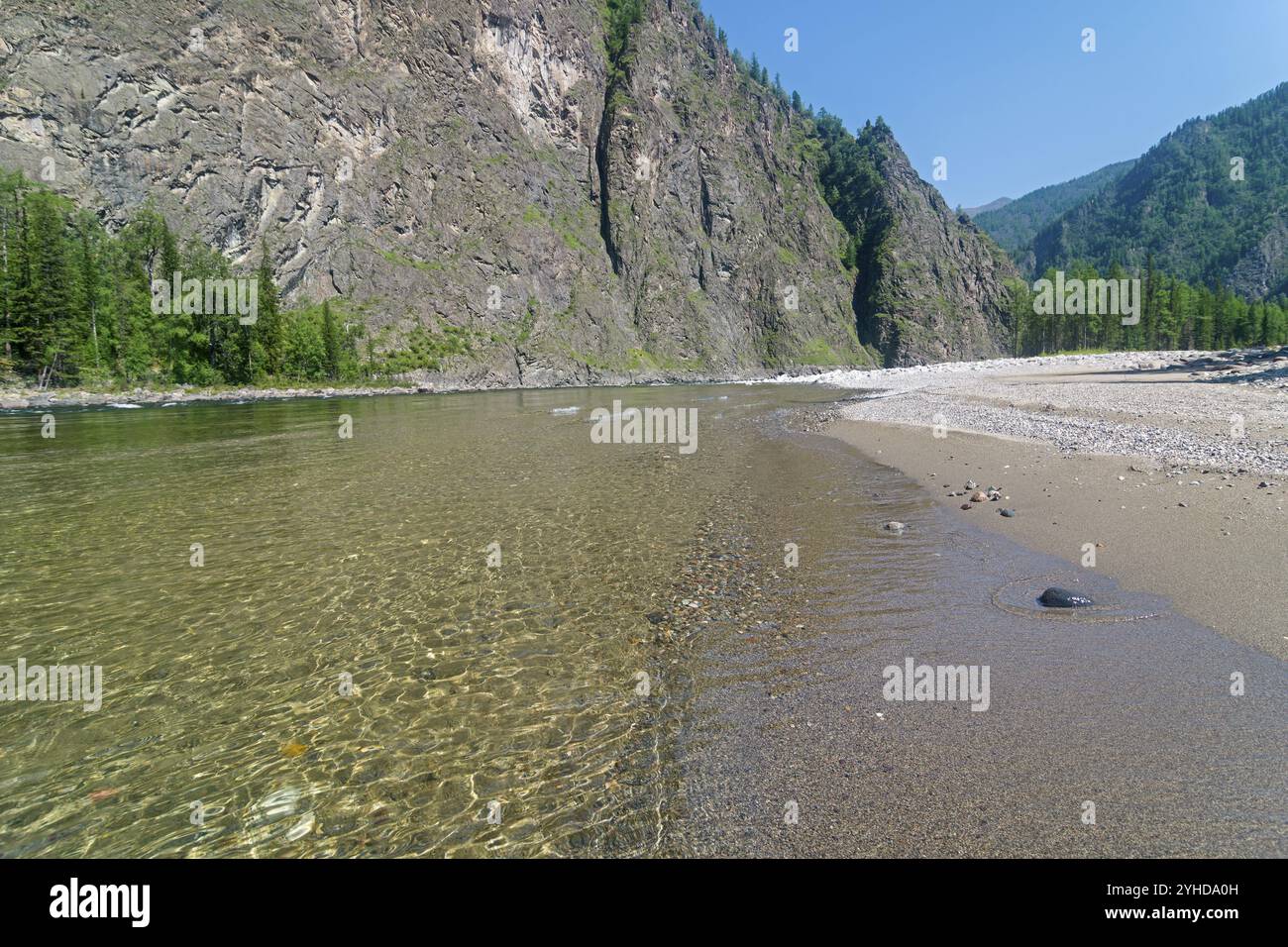 The Oka Sayanskaya River in the Orkho-Bom gorge. A small sandy beach. Sunny summer day. Buryatia, Siberia, Russia, Europe Stock Photo