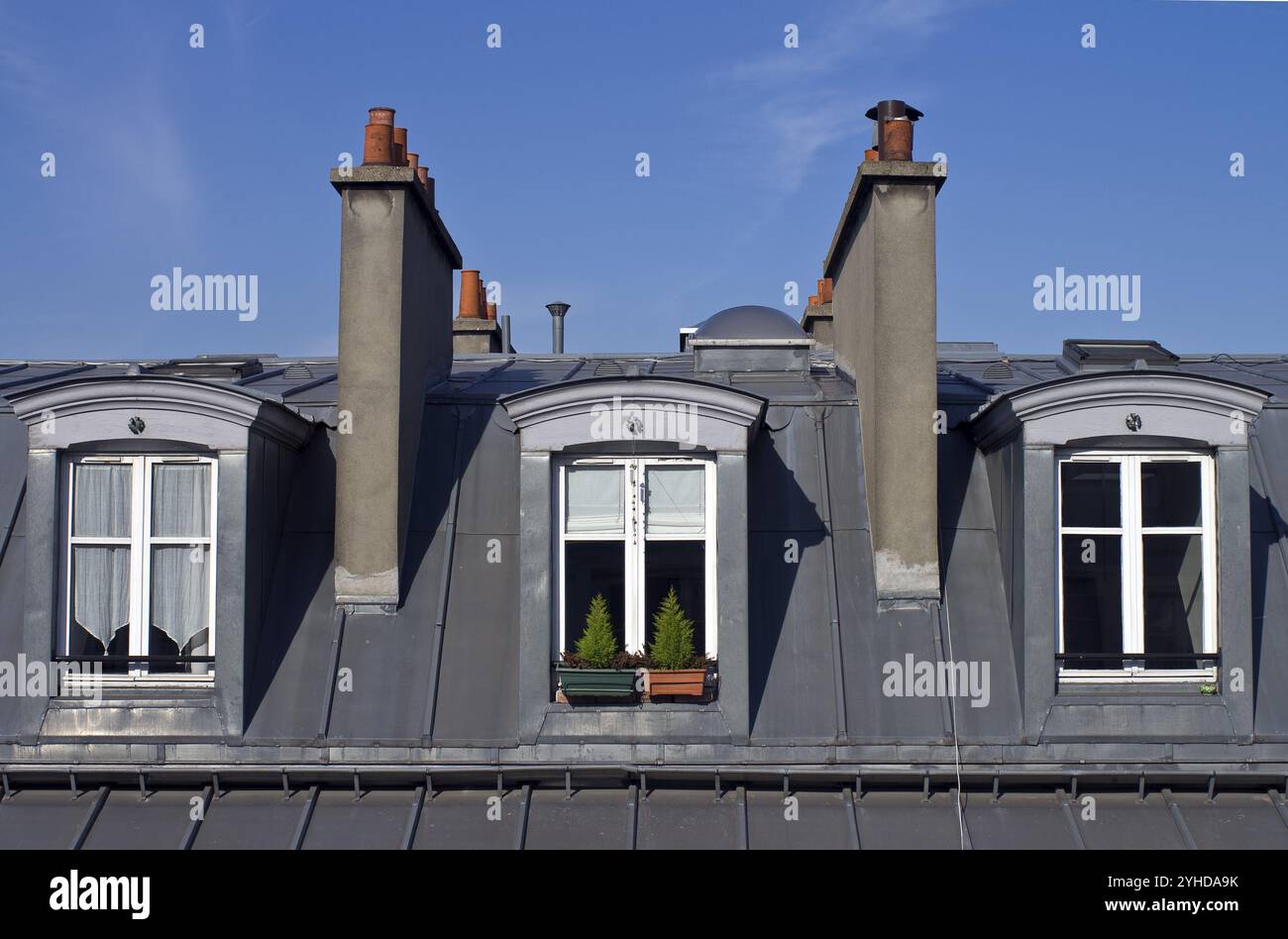 Attic windows in Paris bright sunny morning Stock Photo - Alamy