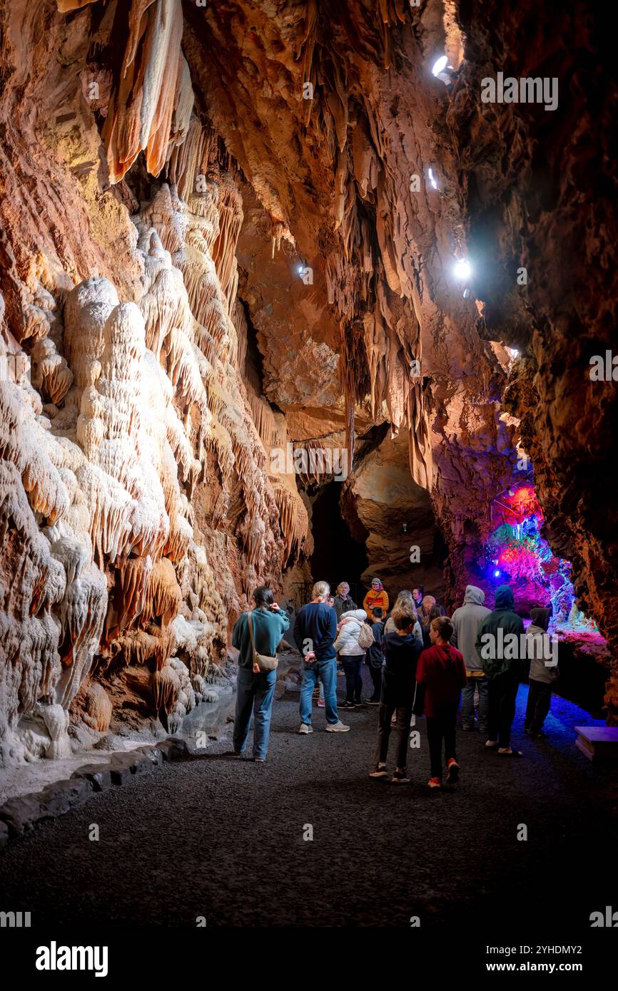 Shenandoah Caverns Cave Formations Quicksburg Virginia // QUICKSBURG, Virginia — Shenandoah Caverns, discovered in 1884 during railroad quarrying operations on Abraham Neff's property, features extensive limestone cave formations accessible by elevator. The caverns, developed for tourism in 1922 by Hunter Chapman, remain the only show cave in Virginia with elevator access. The cave system showcases natural formations including stalactites, stalagmites, and flowstone throughout its developed passageways. Stock Photo