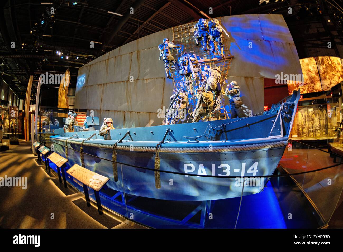 FORT BELVOIR, Virginia — The Higgins Boat (LCVP) exhibit at the National Museum of the United States Army showcases the crucial landing craft of World War II amphibious operations. Designed by Andrew Higgins, these versatile boats carried 36 combat-loaded troops or a jeep with 12 men to beaches across Europe and the Pacific. The display features technical specifications of the craft that became synonymous with Allied amphibious operations. Stock Photo