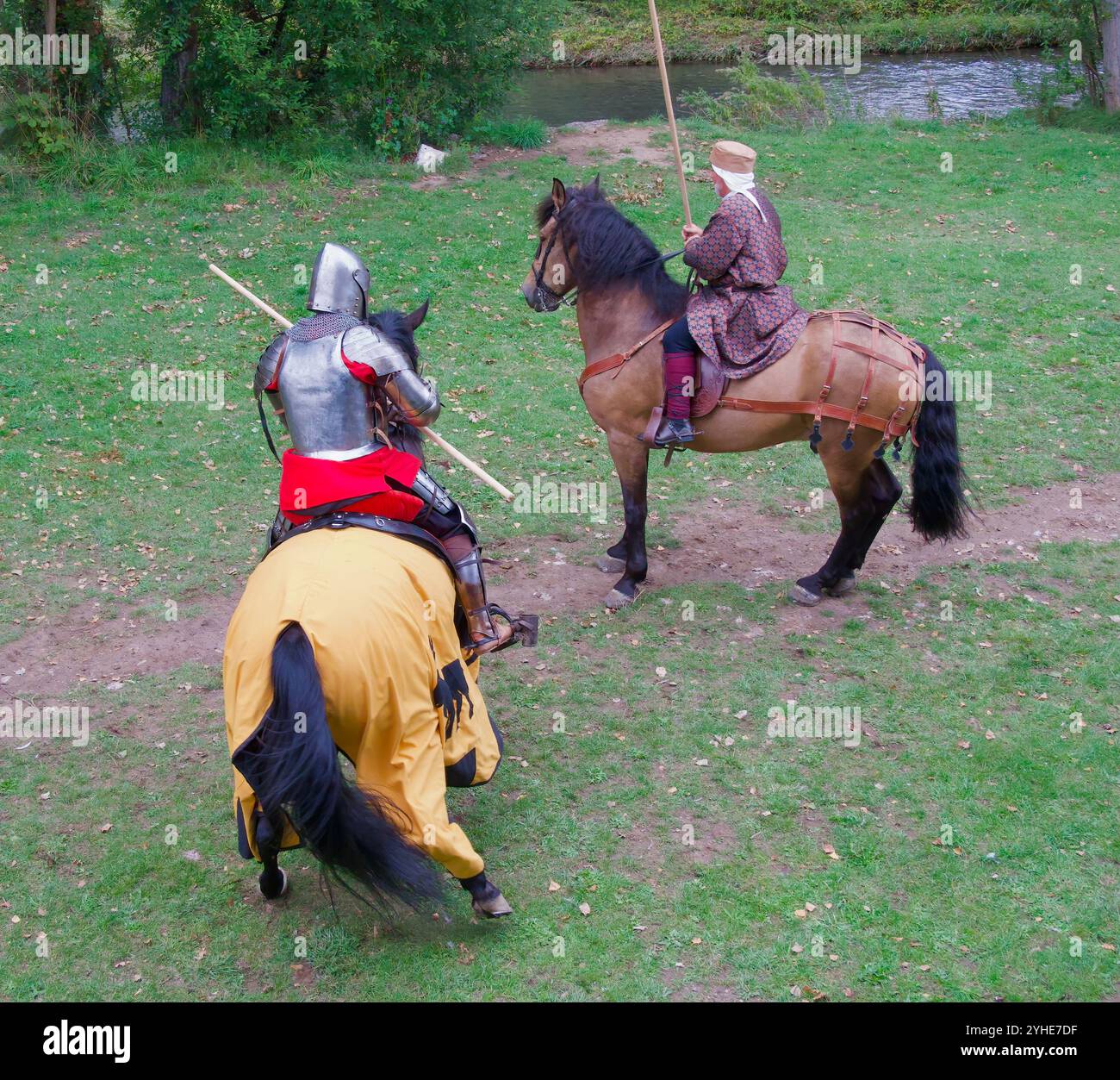 Medieval Ridingguard Participants in medieval costumes riding caparisoned horses during a ...