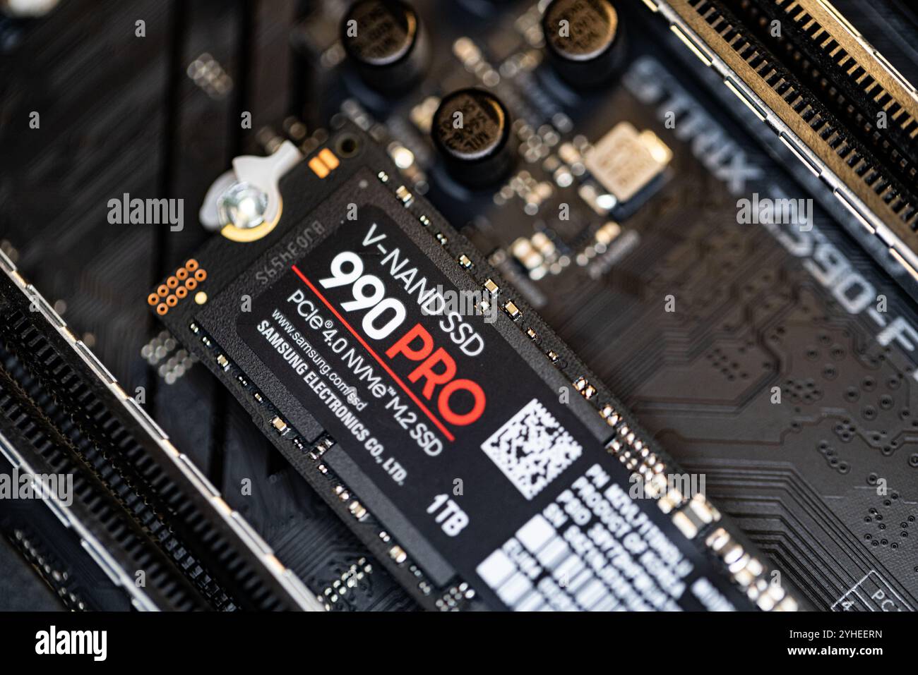 Lviv, Ukraine - October 30, 2024: Samsung SSD 990 PRO PCle 4.0 NVMe M.2 on motherboard background Stock Photo