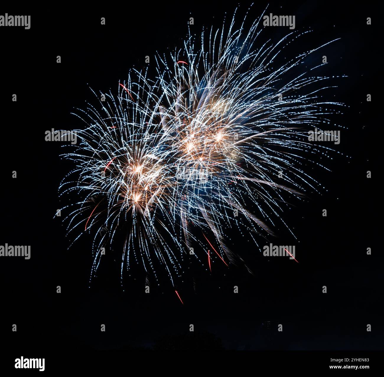Abstract fireworks background on the night sky Stock Photo - Alamy