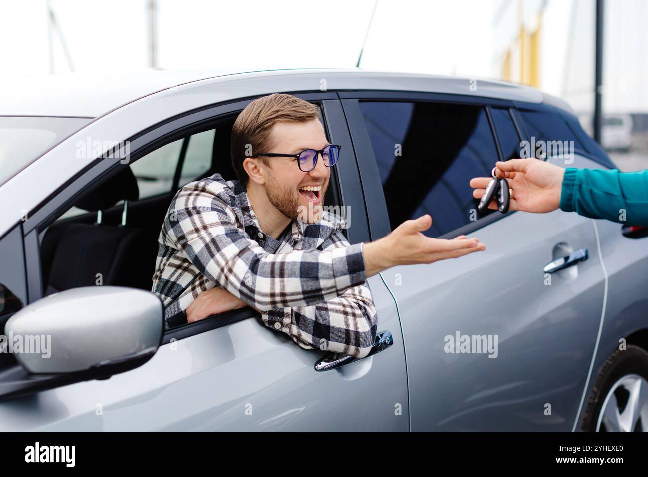 Dealer shaking hand man giving hi-res stock photography and images - Alamy