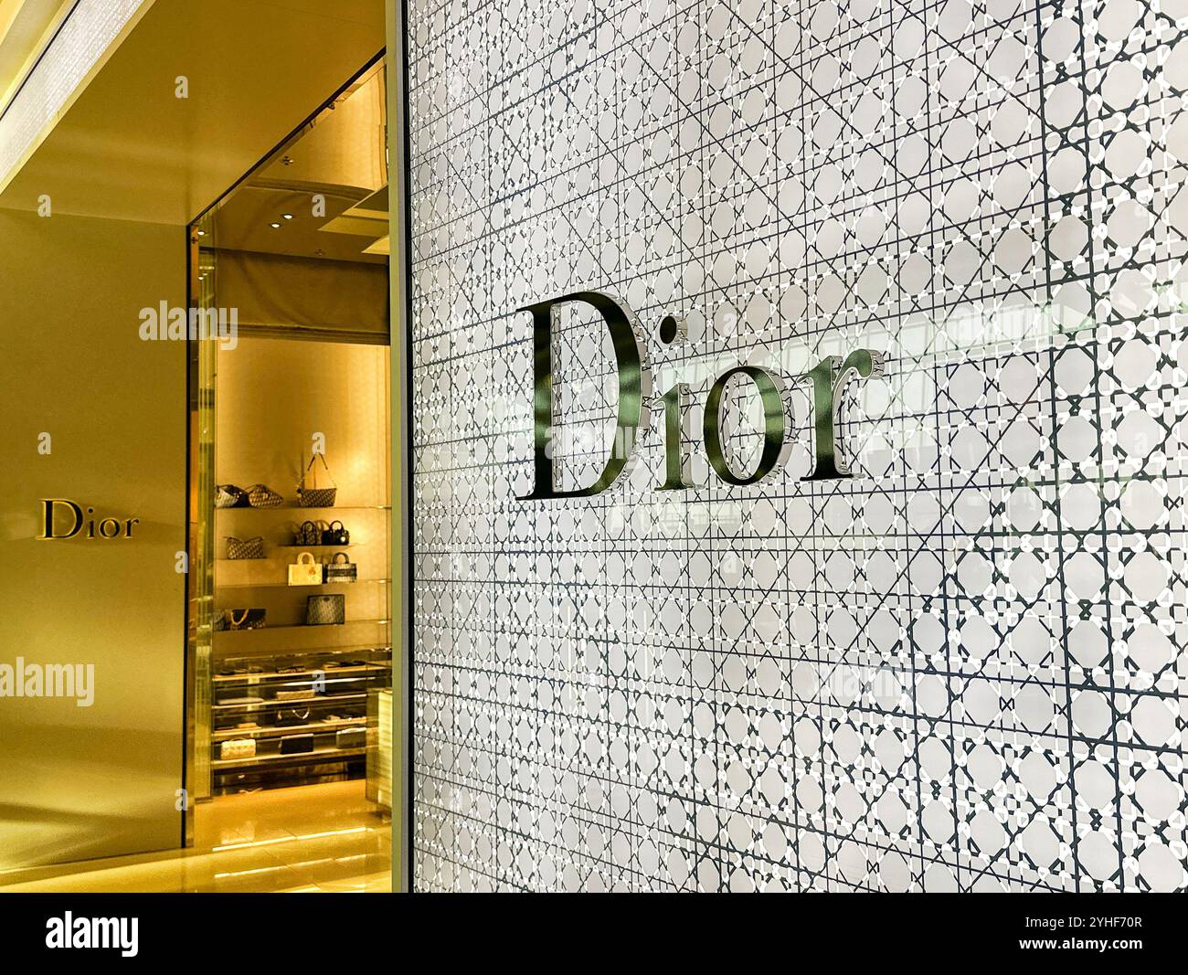 London, England, UK - 21 August 2024: Entrance to a Dior luxury designer goods store in an airport duty free area - Smartphone Captured Stock Image London, England, UK - 21 August 2024: Entrance to a Dior luxury designer goods store in an airport duty free area - Smartphone Captured Stock Image