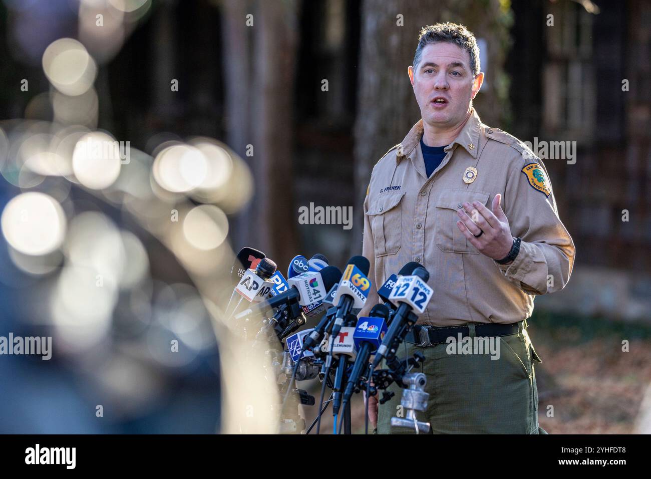 Fire Service Command Post Assistant Division Fire Warden Chris Franek speaks to reporters during ...