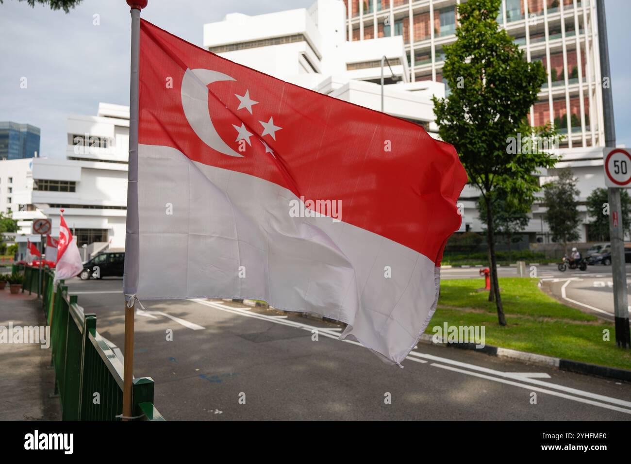 Singapore national flags flown on the streets during National day celebrations. Stock Photo