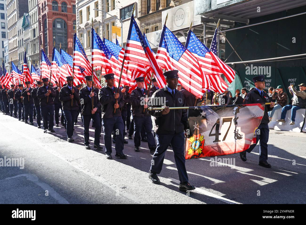 Members of FDNY Color Guard march up 5th Avenue in the 2024 NYC