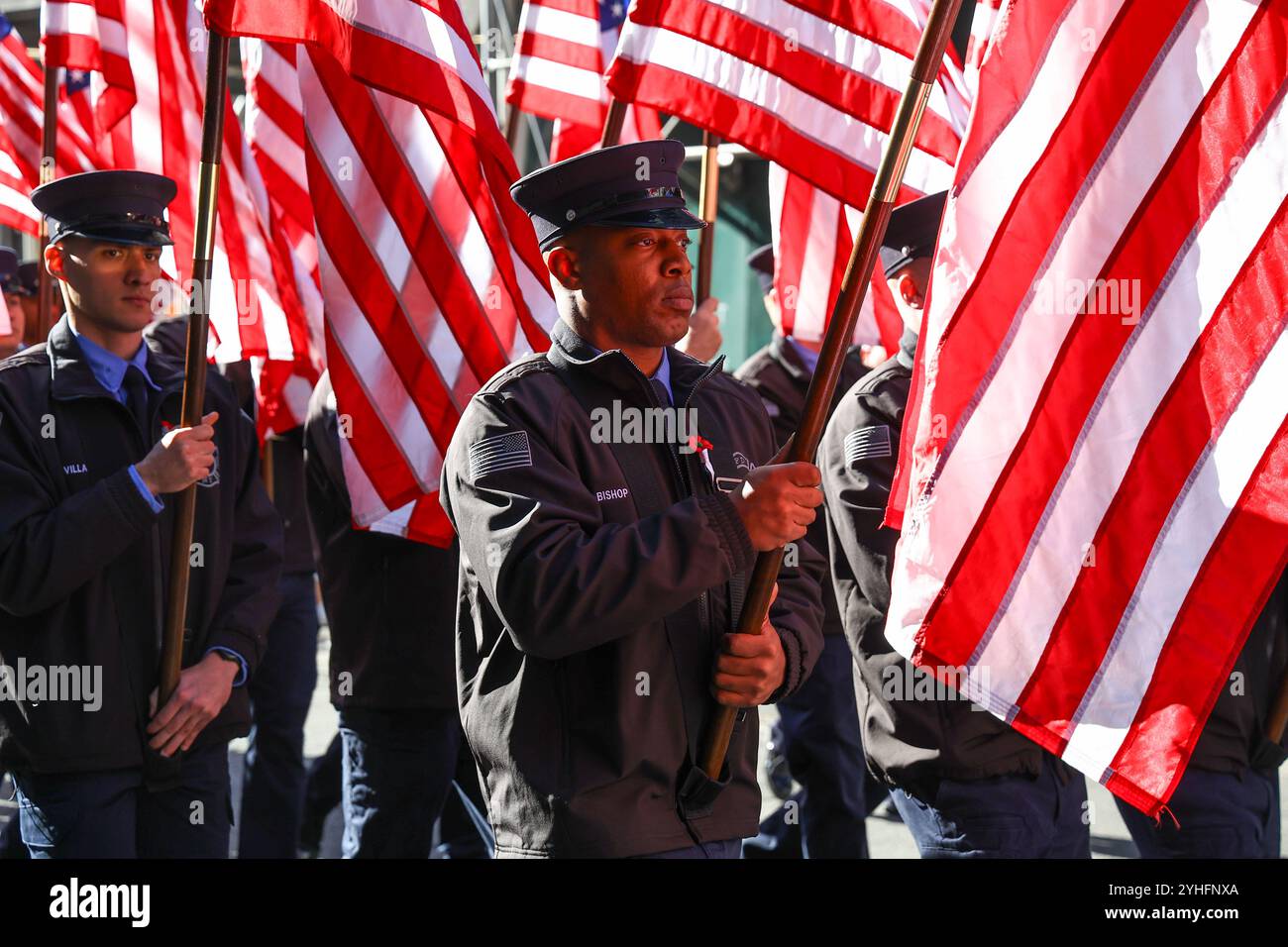 Members of FDNY Color Guard march up 5th Avenue in the 2024 NYC