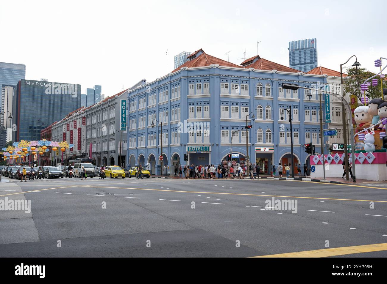 A view of Upper Cross Street and new Bridge Road junction Singapore showing mix of Hotels in heritage buildings in Chinatown area. Stock Photo