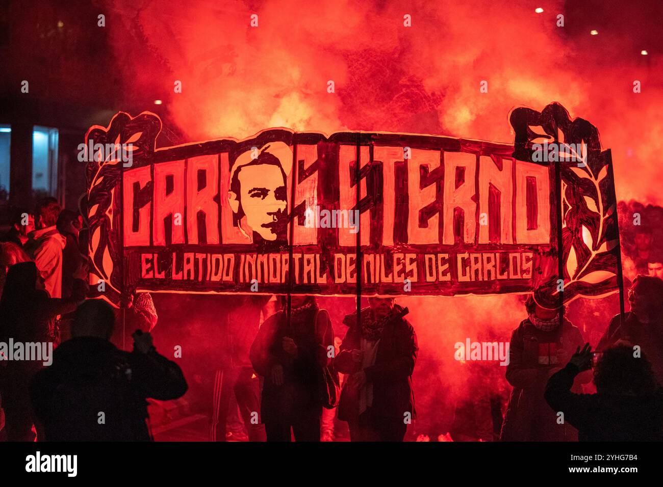 Madrid, Spain. 11th Nov, 2024. Protesters hold a banner with the slogan 'Carlos eternal' during a demonstration. Hundreds of anti-fascist protesters have commemorated the 17th anniversary of the murder of Carlos Palominos, a young man from Madrid killed by the former neo-Nazi soldier Josué Estébanez in 2007 and who is currently serving a sentence. Credit: SOPA Images Limited/Alamy Live News Stock Photo