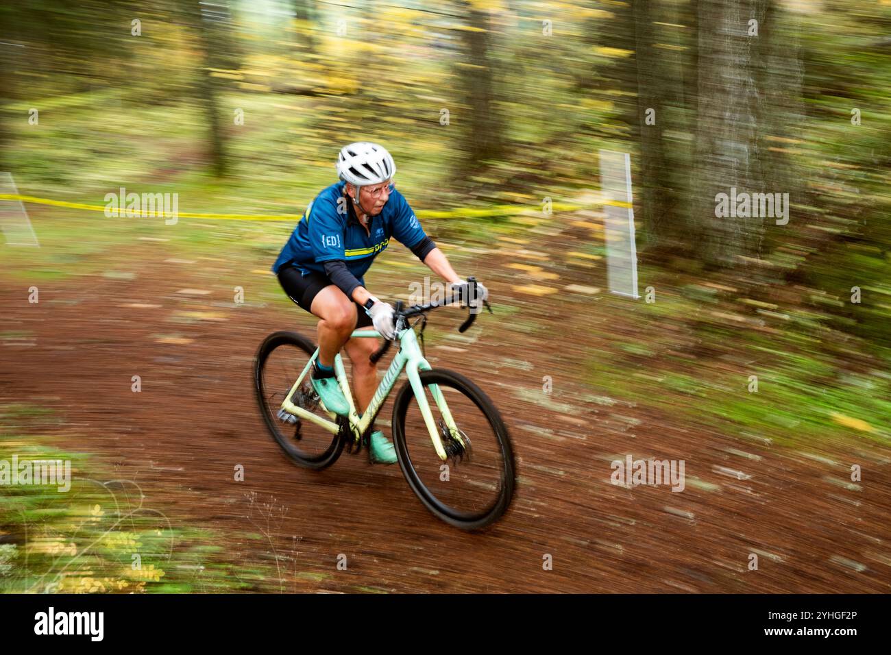 WA26213-00..... WASHINGTON - Womans 60+ age group cyclocross race in Graham at Frontier Park. Lori Montoya Brazel. Stock Photo