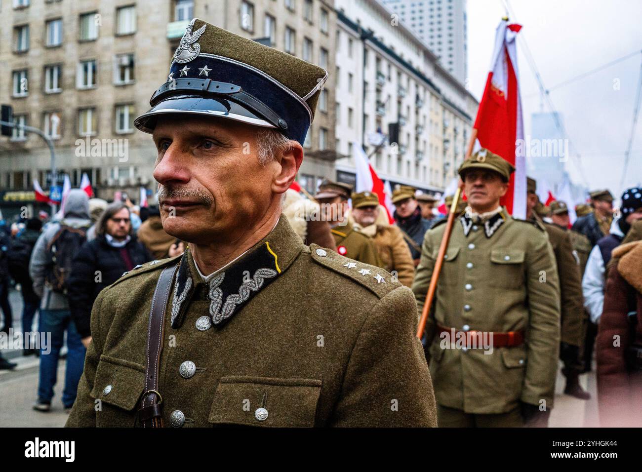Warsaw, Poland. 11th Nov, 2024. Men dressed in military outfits march through the streets of Warsaw. Polish citizens from all over the country march through the streets of Warsaw to celebrate Independence Day. The event gathers tens of thousands of participants, with patriotic Poles gathering to celebrate. Many families bringing their children. Credit: SOPA Images Limited/Alamy Live News Stock Photo