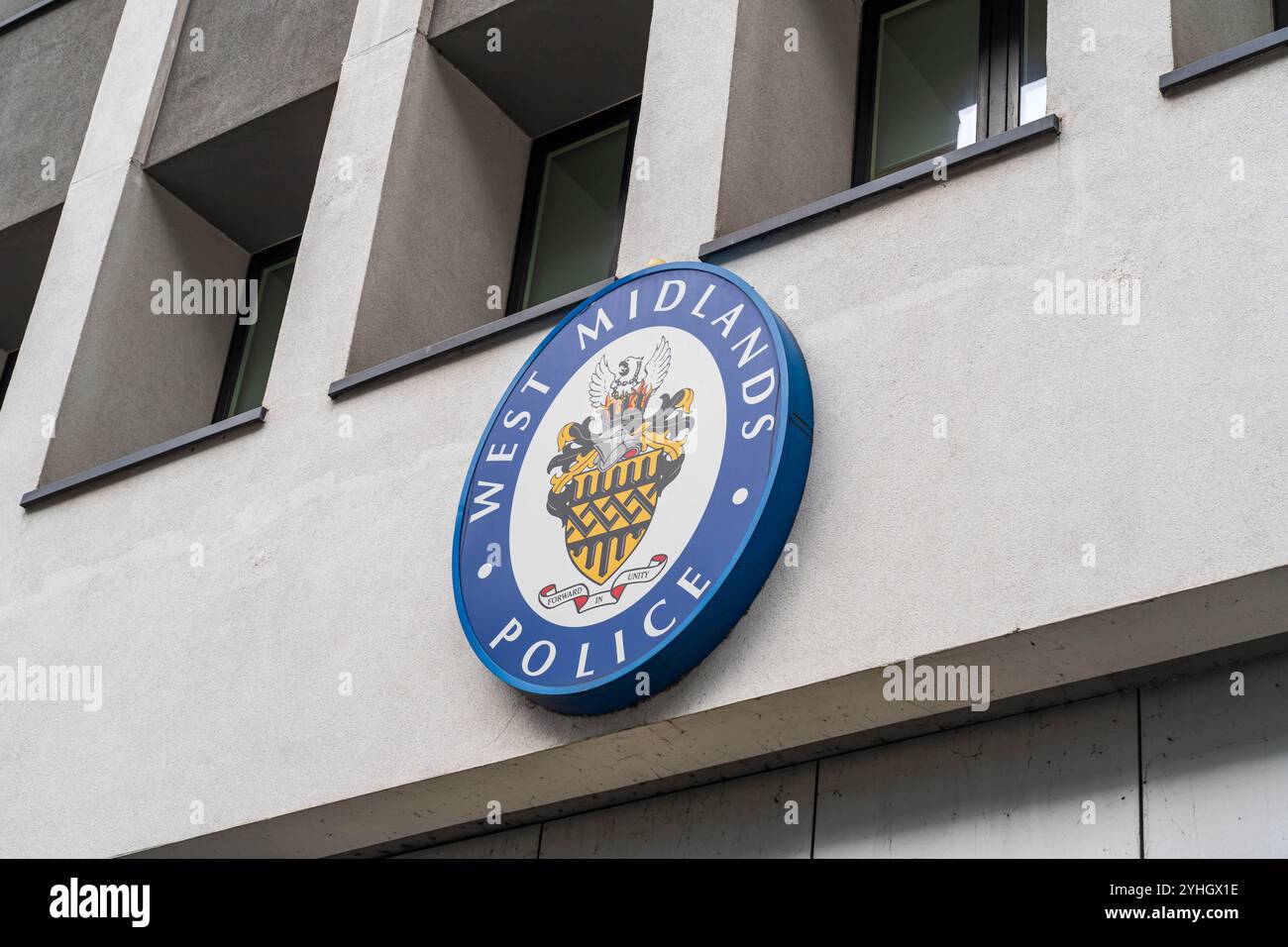 Birmingham, UK – November 11 2024:  External signage of the West Midlands Police crest outside of Police Headquarters at Lloyd House, Birmingham Stock Photo