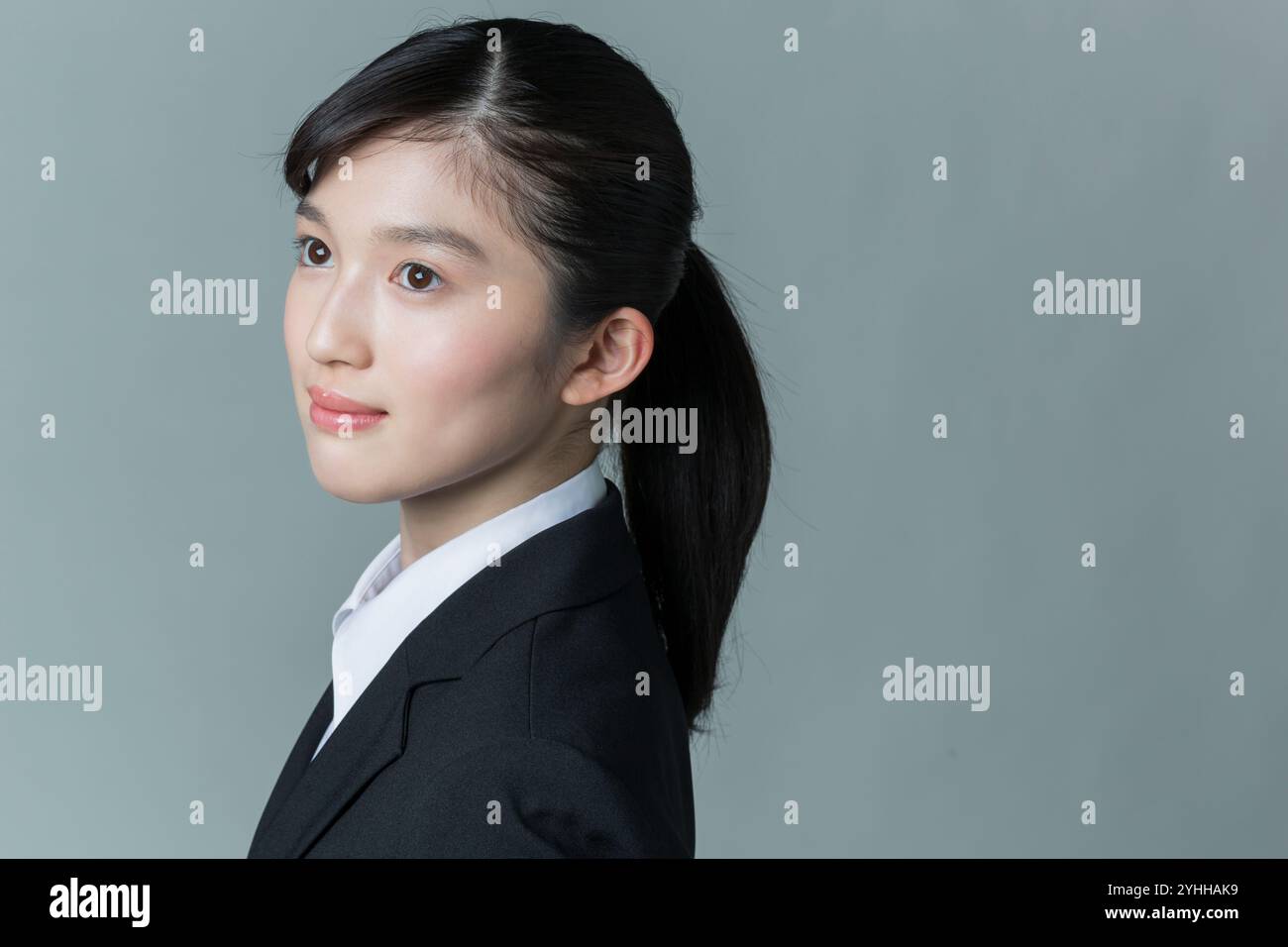 Serious young woman suit hi-res stock photography and images - Alamy