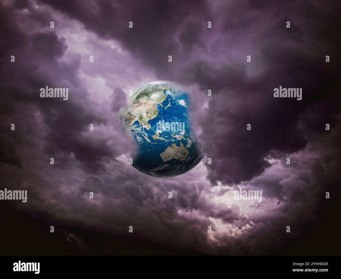 Earth in dark clouds Stock Photo