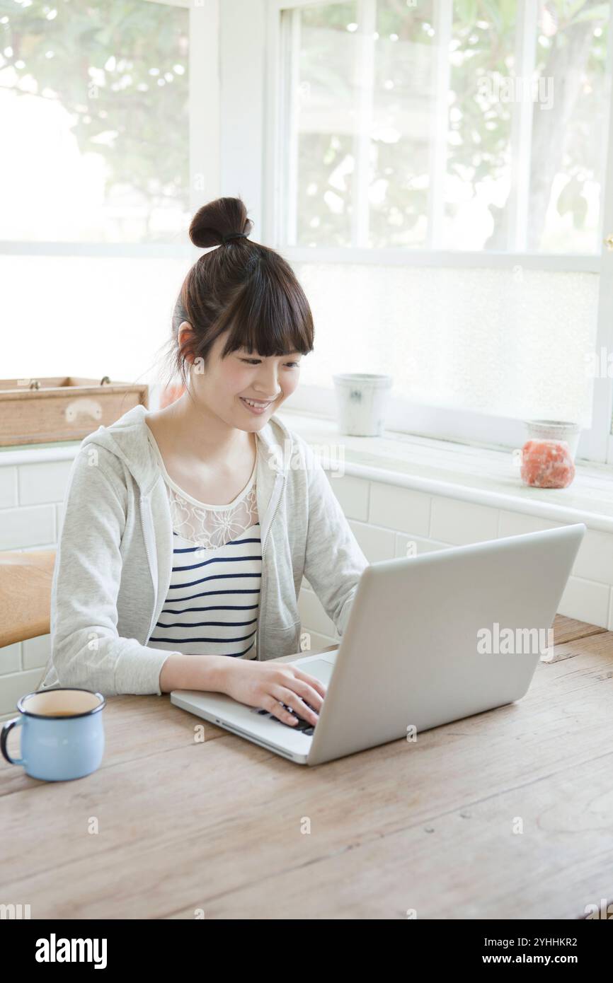 Teenage female university student using a computer Stock Photo - Alamy