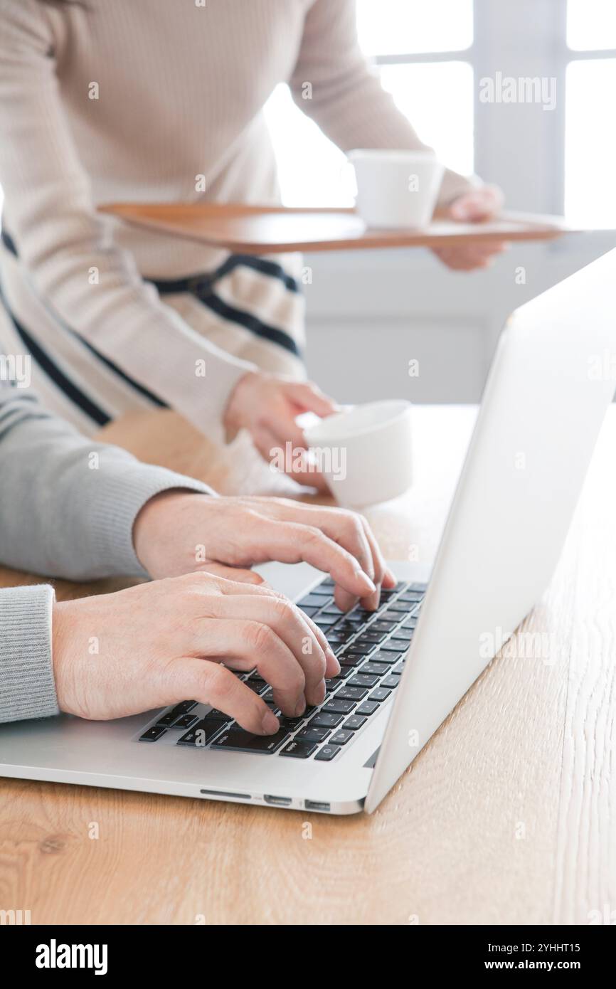 Hand senior operating computer hi-res stock photography and images - Alamy