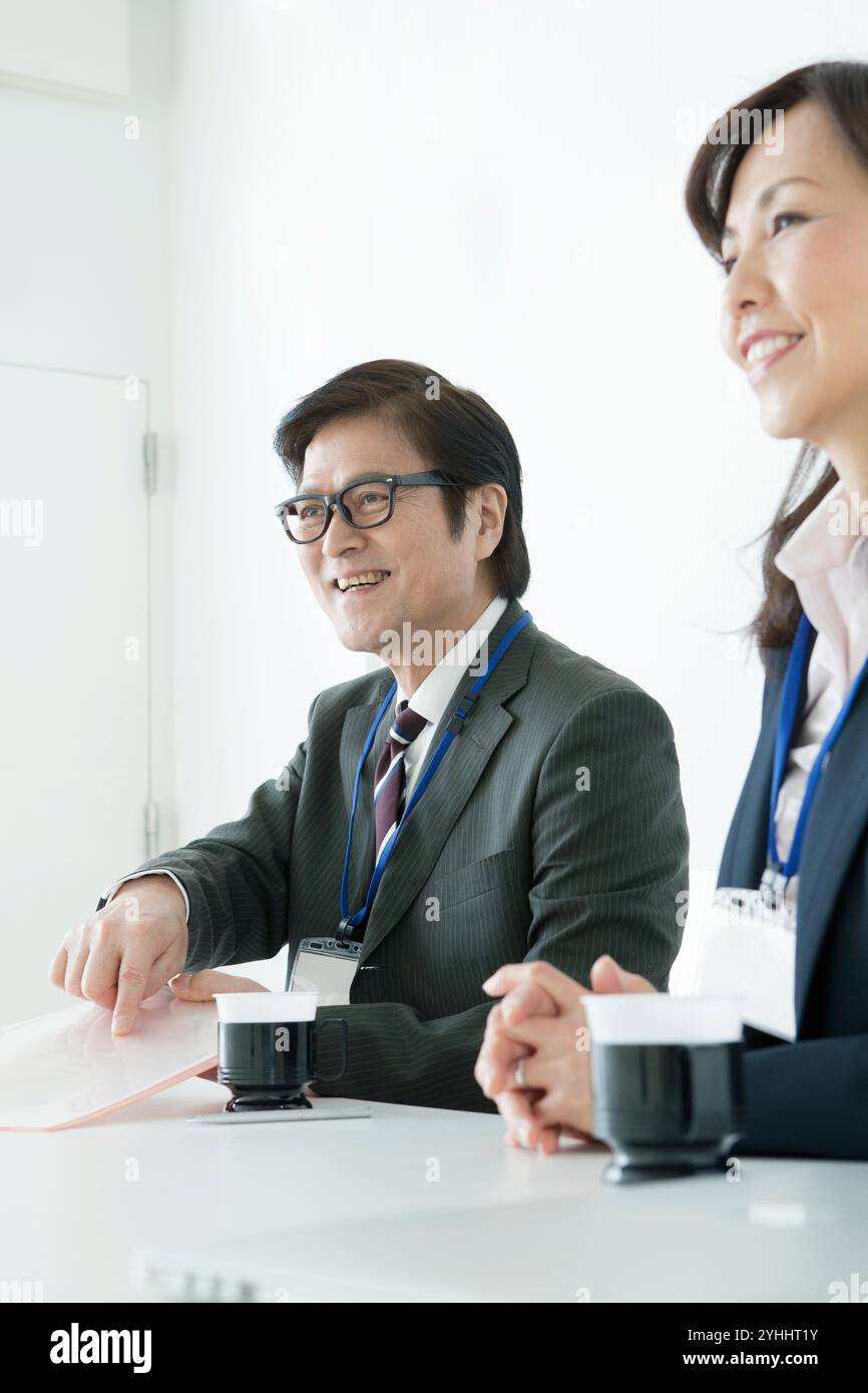 Women in suits hi-res stock photography and images - Alamy