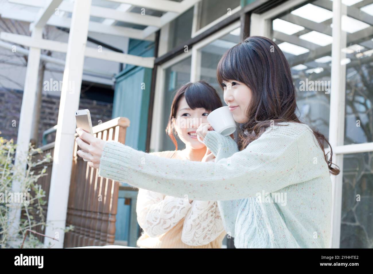 Two women taking selfies hi-res stock photography and images - Alamy