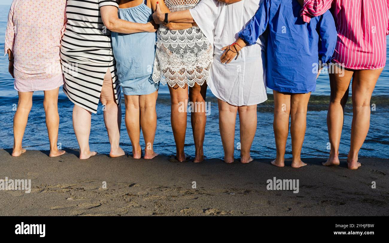A group of women standing line hi-res stock photography and images - Alamy
