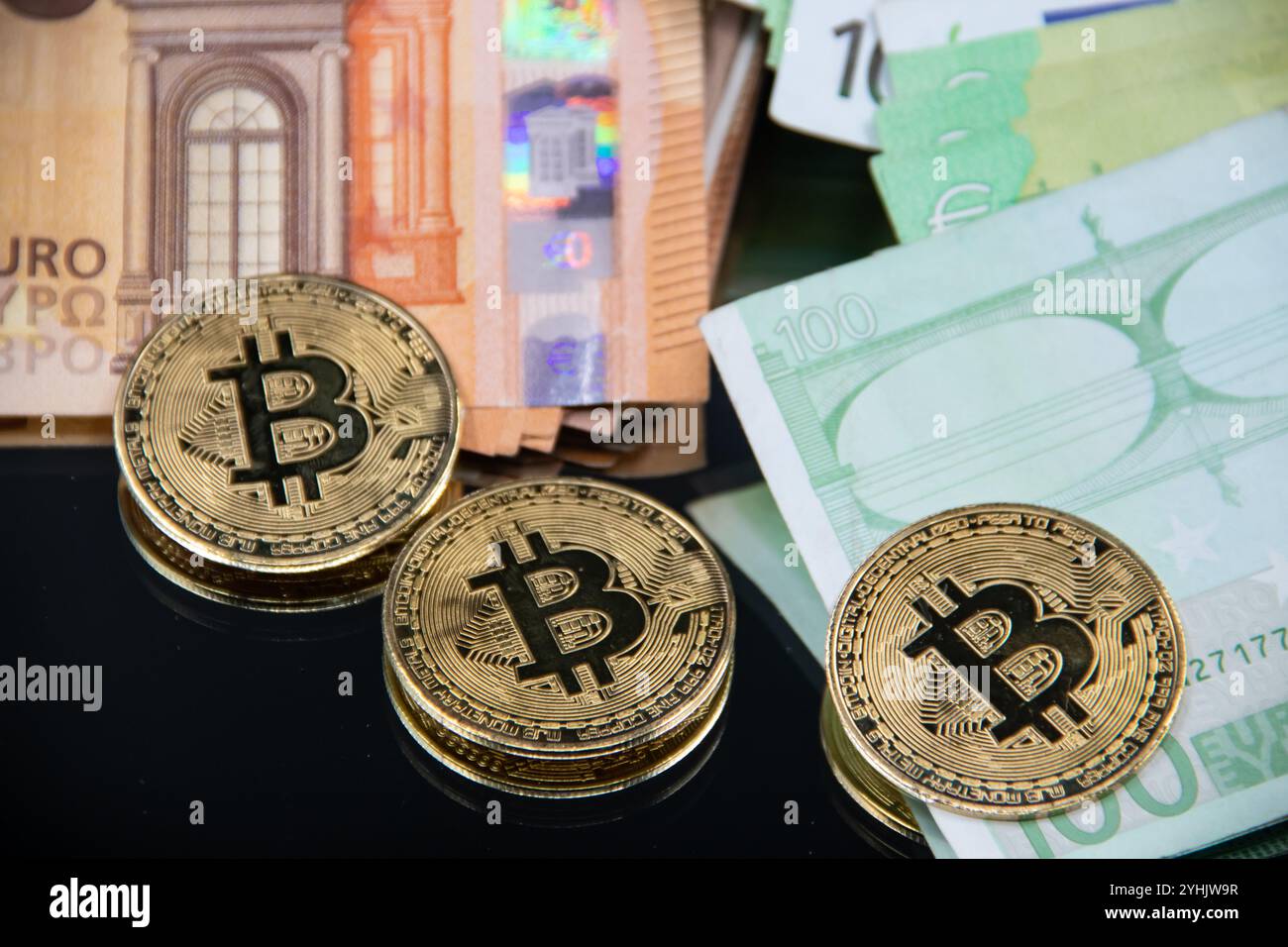 Golden bitcoin in a pile of coins on the background of Societe Generale  bank logo Stock Photo - Alamy