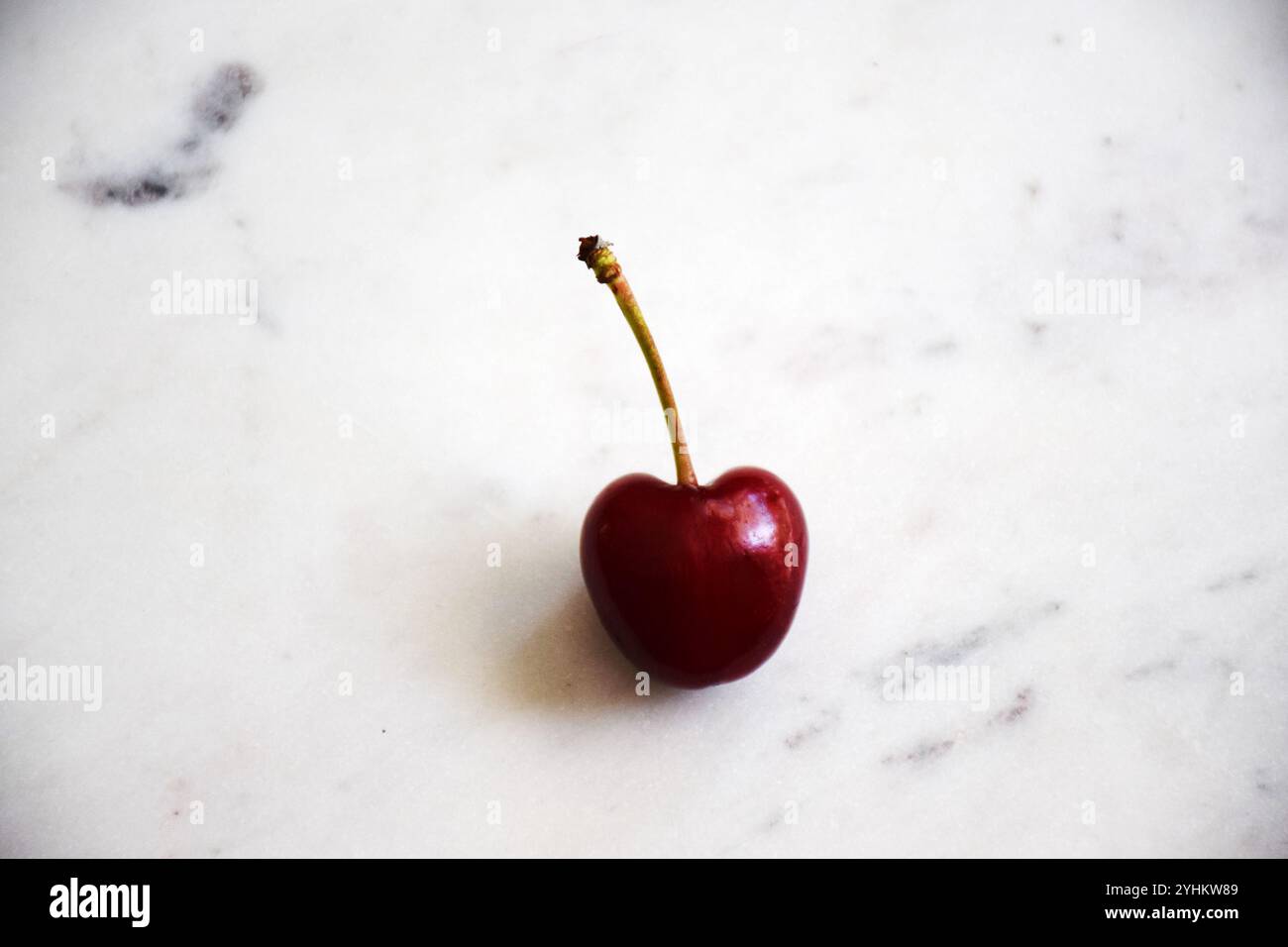 Red single cherry hi-res stock photography and images - Alamy