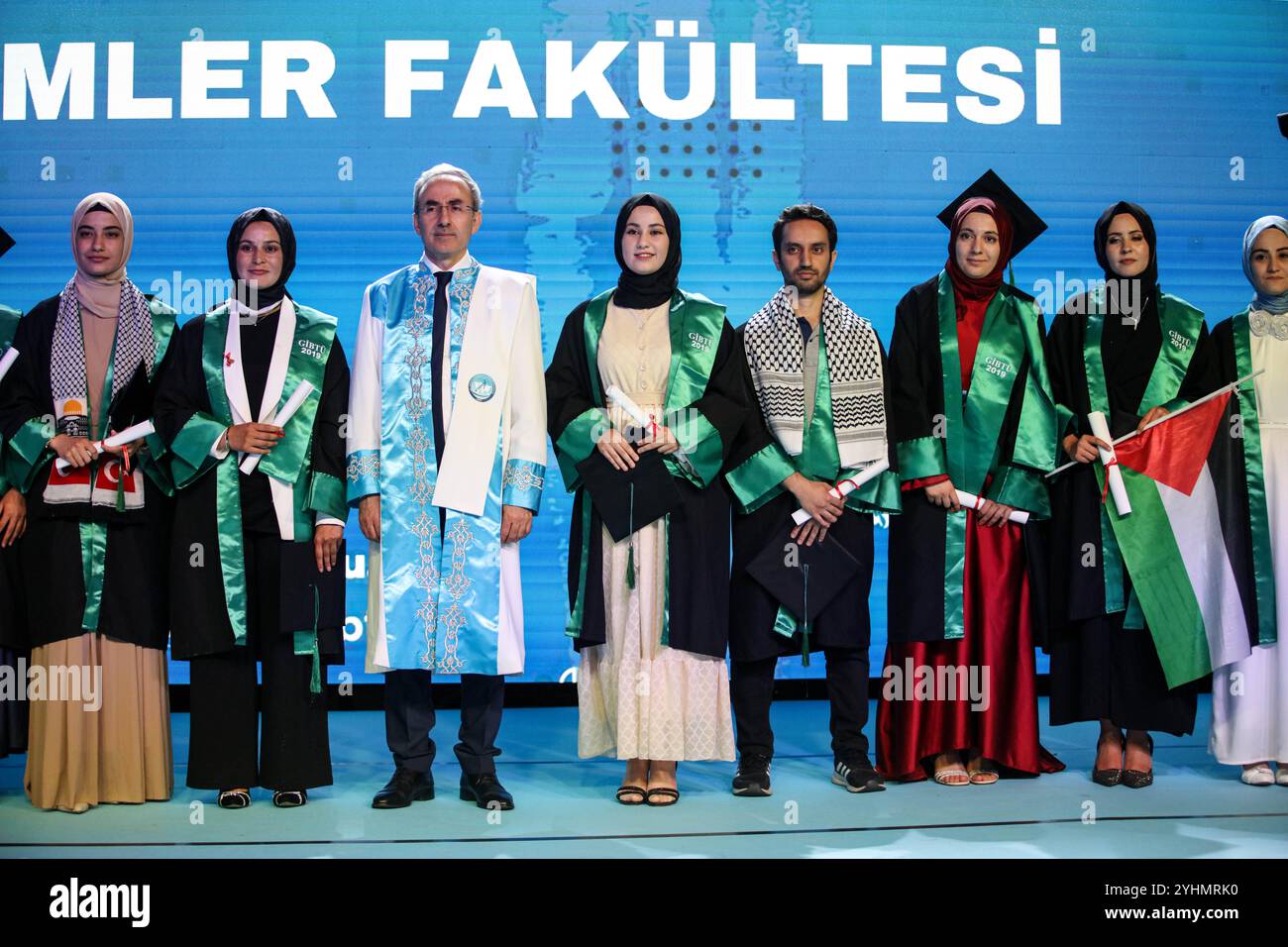 Gaziantep, Turkiye. 24 May 2024. Students from different faculties attend their graduation ceremony at the Gaziantep University of Islamic Science and Technology (GIBTU). During the ceremony, a number of students wore the Palestinian kufiyah and raised the Palestinian flag in solidarity with Gaza and Palestine Stock Photo