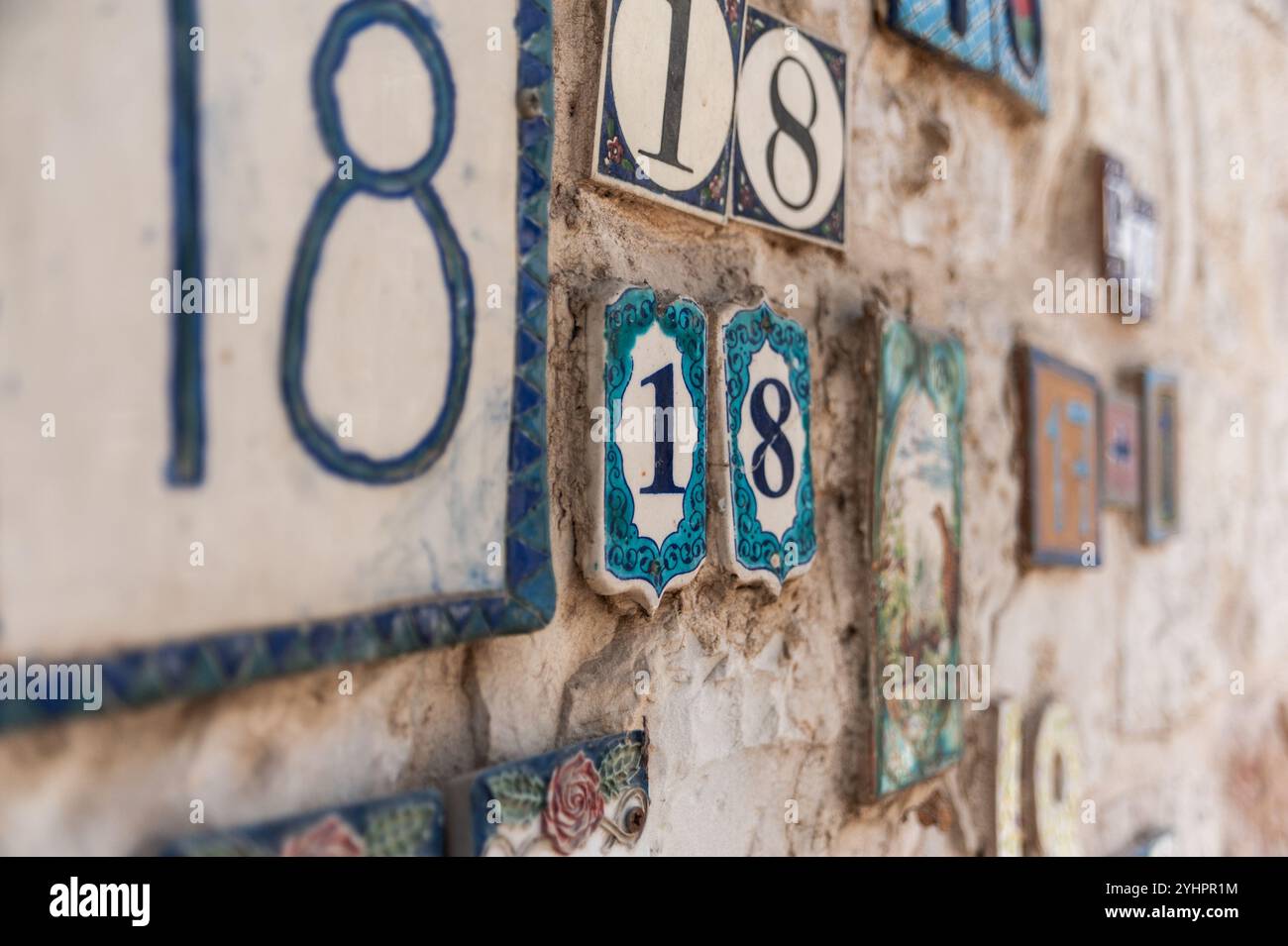 The number 18 outside a home in Jerusalem. Eighteen is special in Judaism because its Hebrew letters have the numerical value of the word 'chai' meani Stock Photo