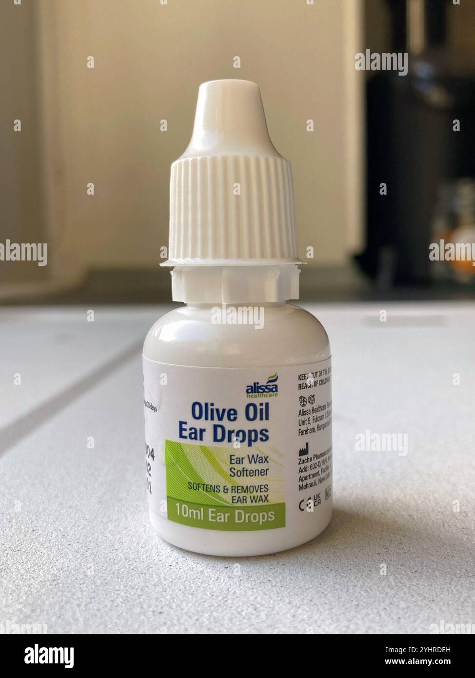 Olive Oil Ear Drops Earwax softener for a blocked ear - Smartphone Captured Stock Image