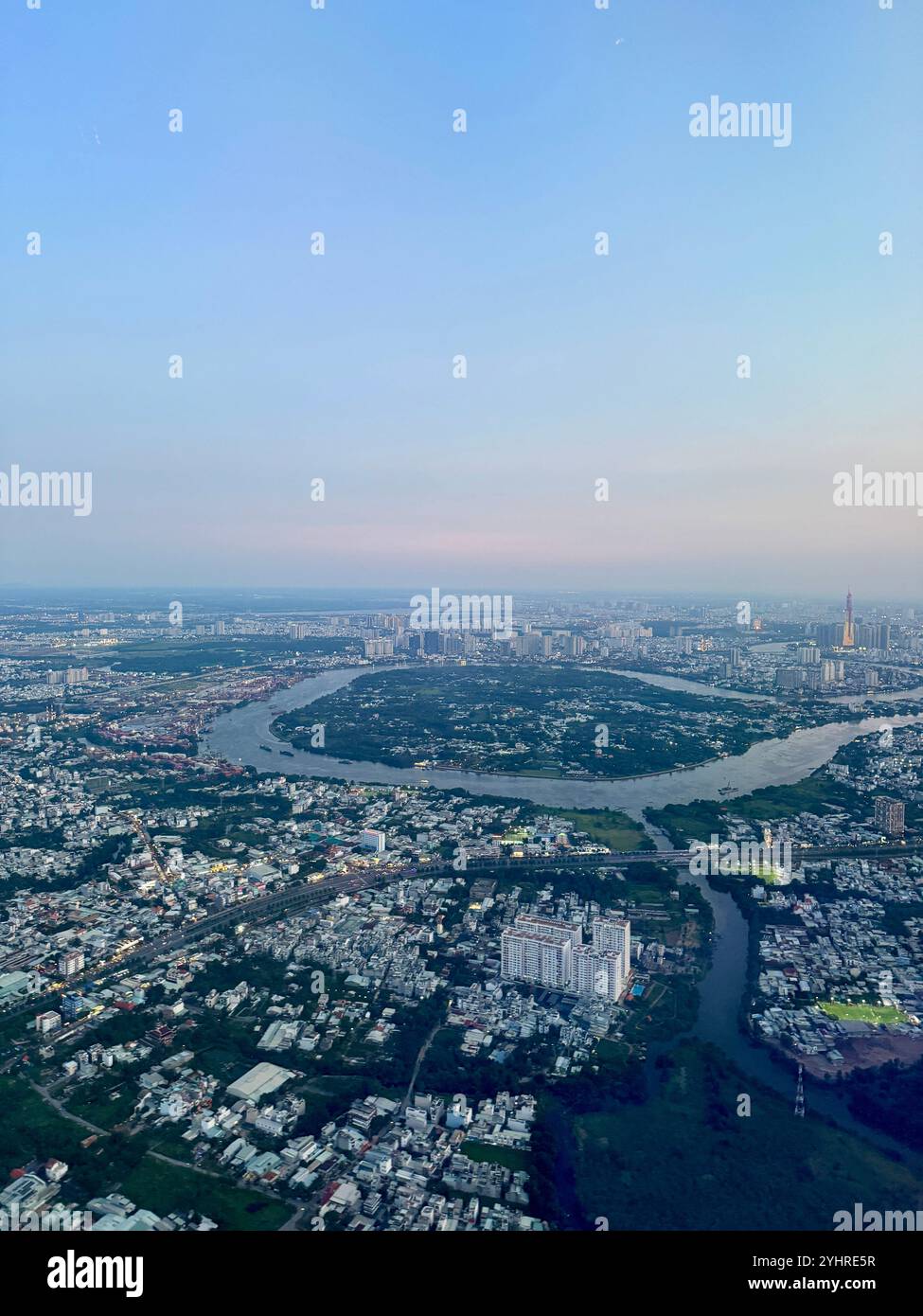 Sunset time, Aerial view of the city before landing in Ho Chi Minh , Vietnam - Smartphone Captured Stock Image