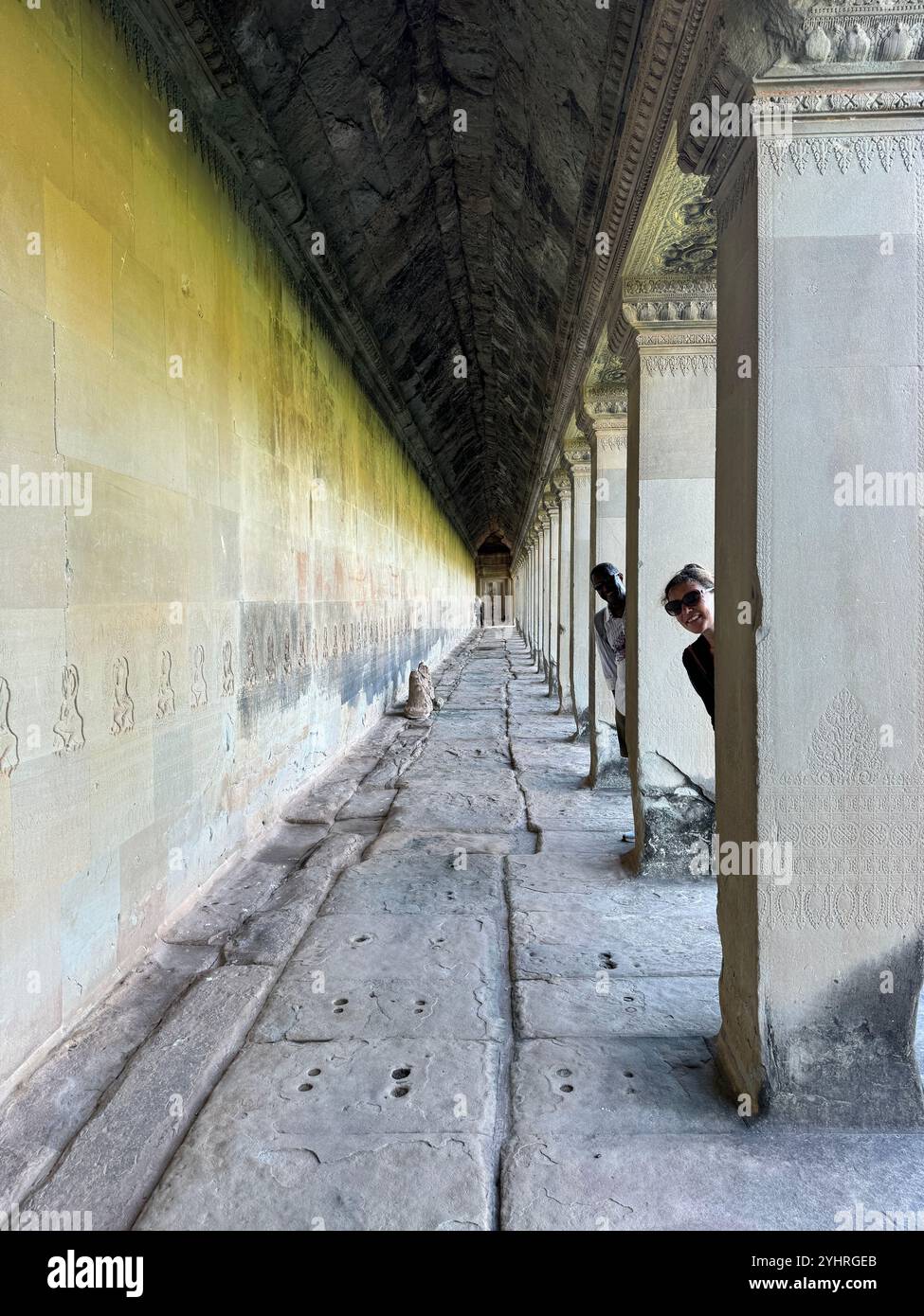 Angkor Wat  - a hindu & buddhist temple , located within the ancient Khmer capital city , Unesco world heritage site, Siem Reap , Cambodia - Smartphone Captured Stock Image