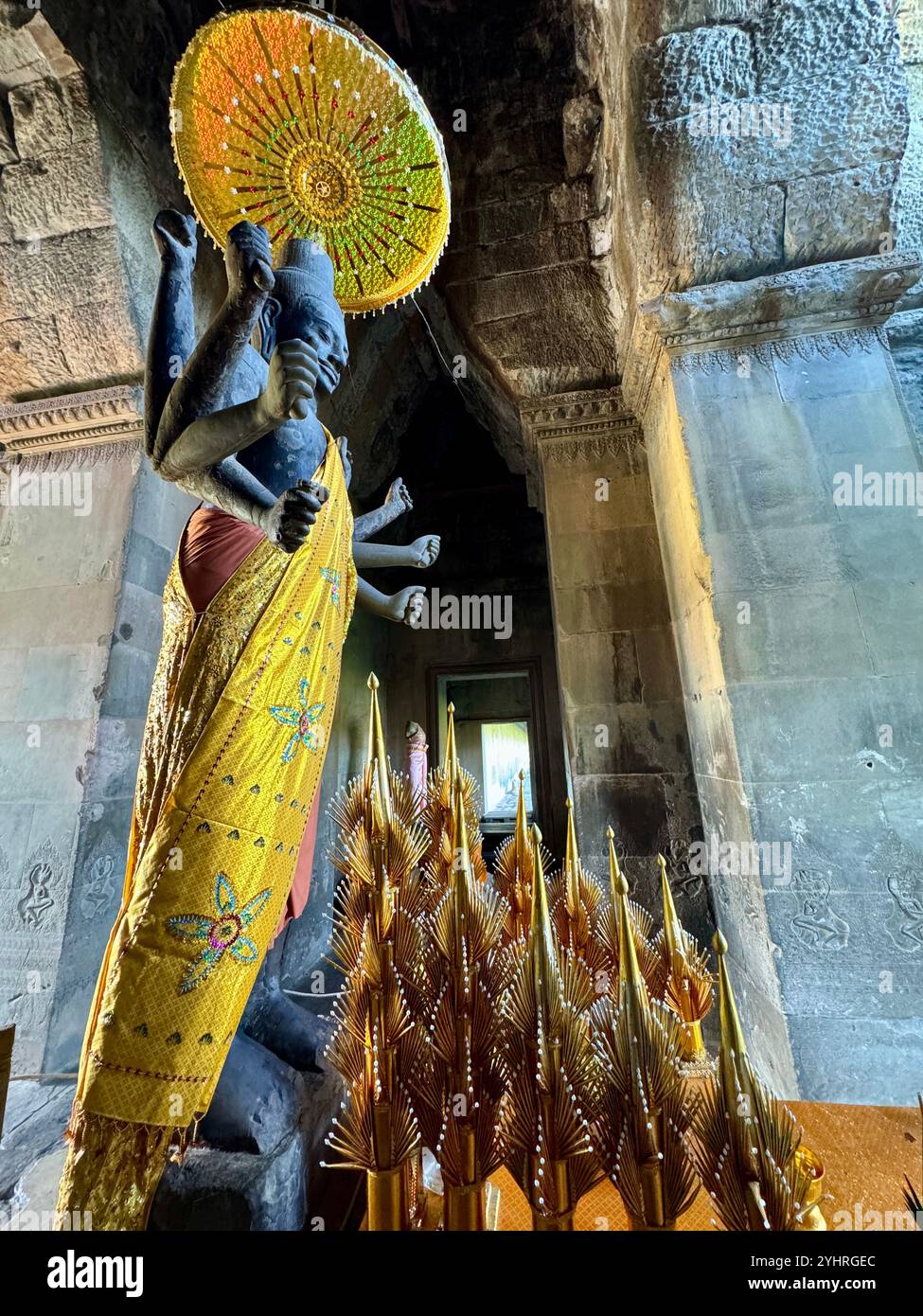 5 meters high Statue of Vishnu , an important deity in hinduism , dating back from the 12th century , Angkor Wat , Siem Reap, Cambodia - Smartphone Captured Stock Image