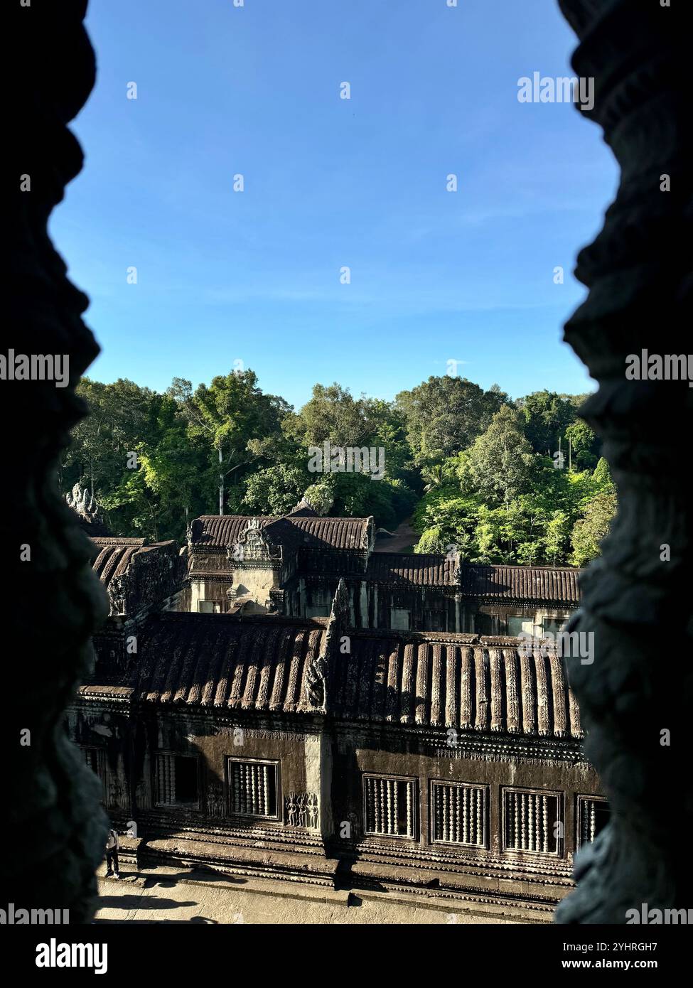 Angkor Wat  - a hindu & buddhist temple , located within the ancient Khmer capital city , Unesco world heritage site, Siem Reap , Cambodia - Smartphone Captured Stock Image