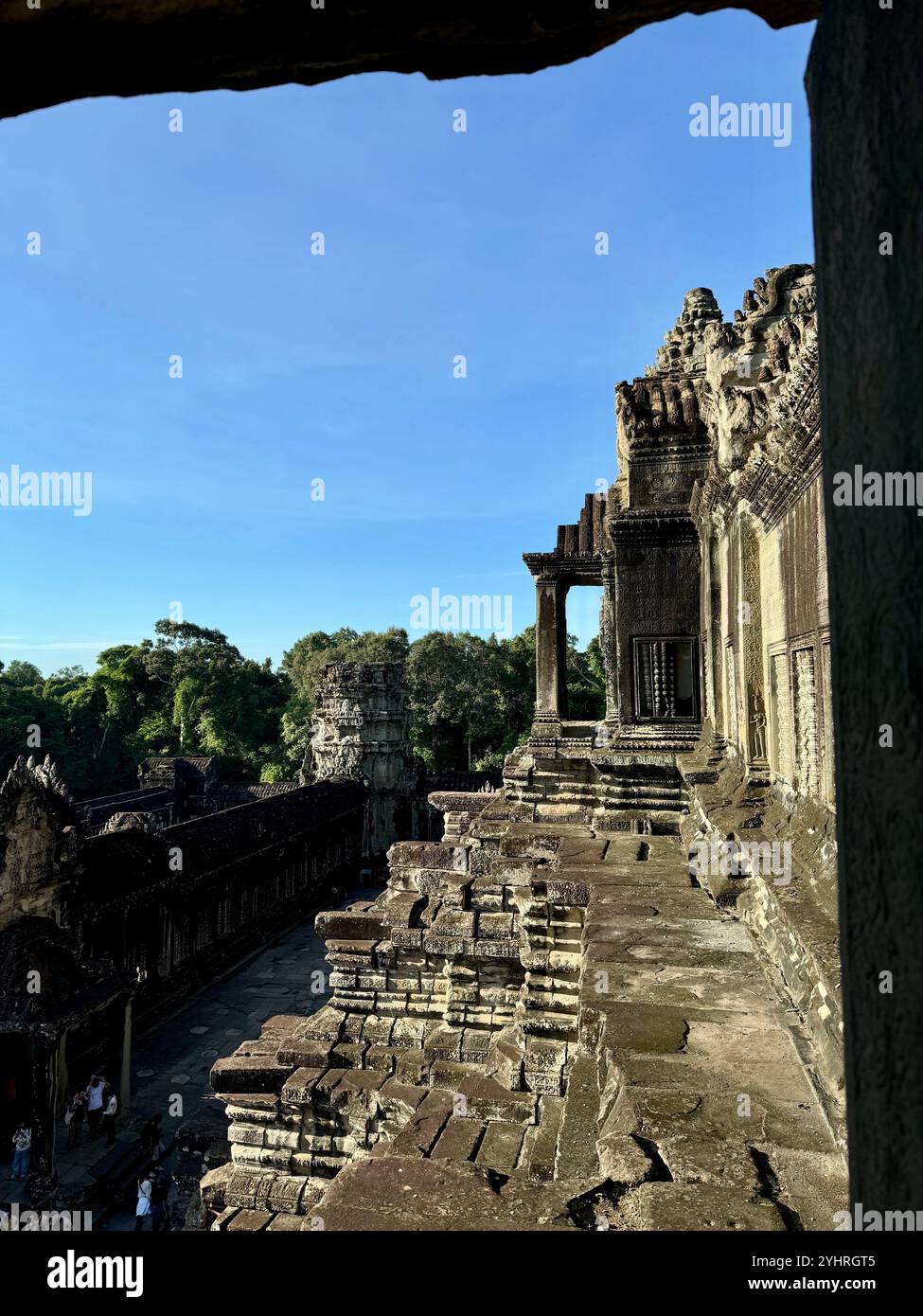 Angkor Wat  - a hindu & buddhist temple , located within the ancient Khmer capital city , Unesco world heritage site, Siem Reap , Cambodia - Smartphone Captured Stock Image