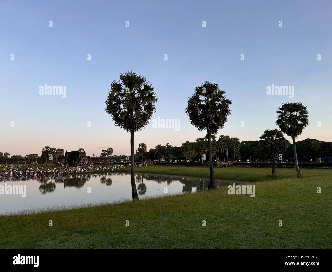 Sunrise at Angkor Wat  - a hindu & buddhist temple , located within the ancient Khmer capital city , Unesco world heritage site, Siem Reap , Cambodia - Smartphone Captured Stock Image