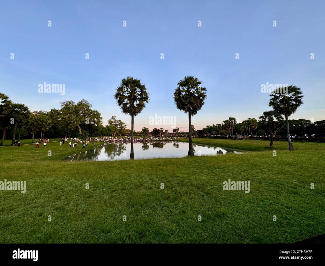 Sunrise at Angkor Wat  - a hindu & buddhist temple , located within the ancient Khmer capital city , Unesco world heritage site, Siem Reap , Cambodia - Smartphone Captured Stock Image
