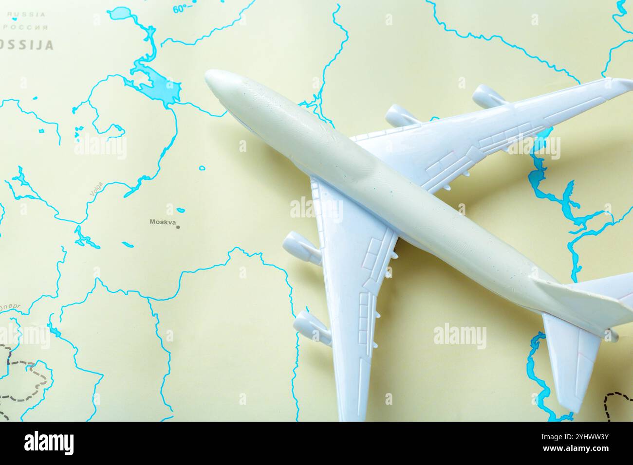 Model Aircraft Map miniature of a passenger aircraft flying on a map Stock Photo - Alamy