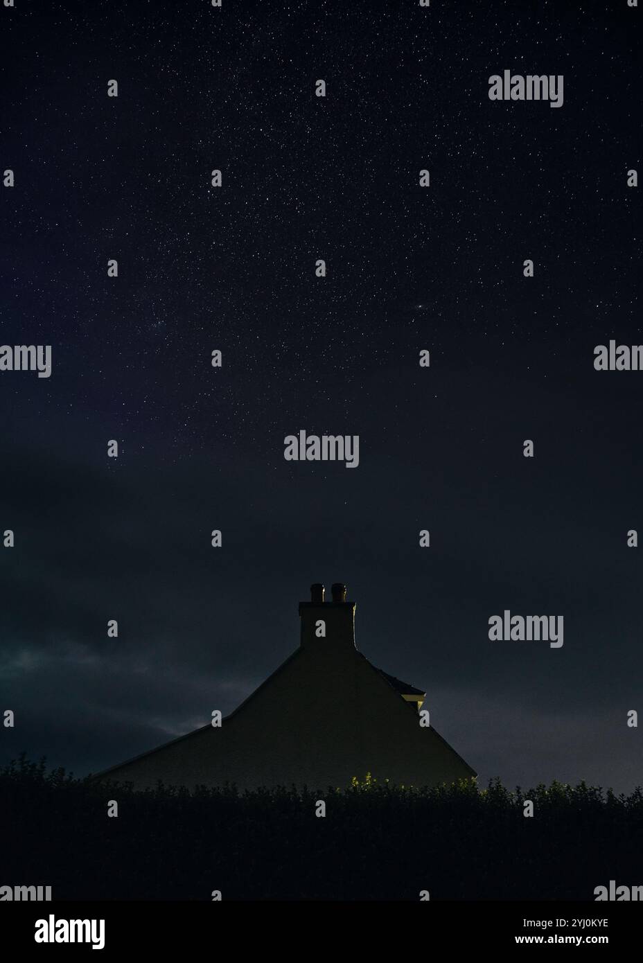 The night starry sky and a lonely house. Isle of Skye, Scotland Stock ...