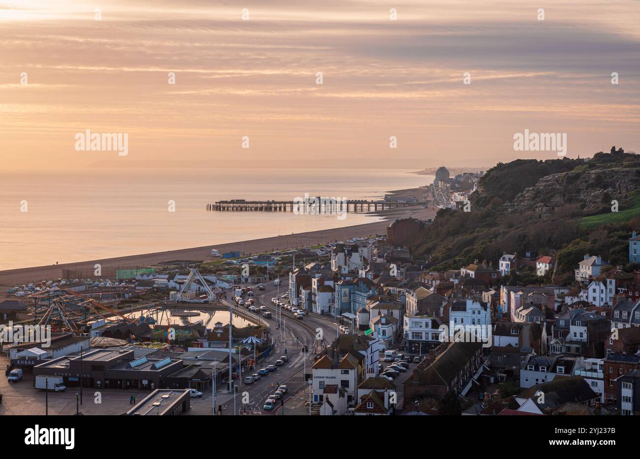 Sunset over Hastings old town from the top of east Hill east Sussex south east England UK Stock Photo
