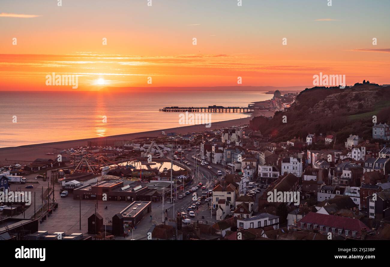 Sunset over Hastings old town from the top of east Hill east Sussex south east England UK Stock Photo
