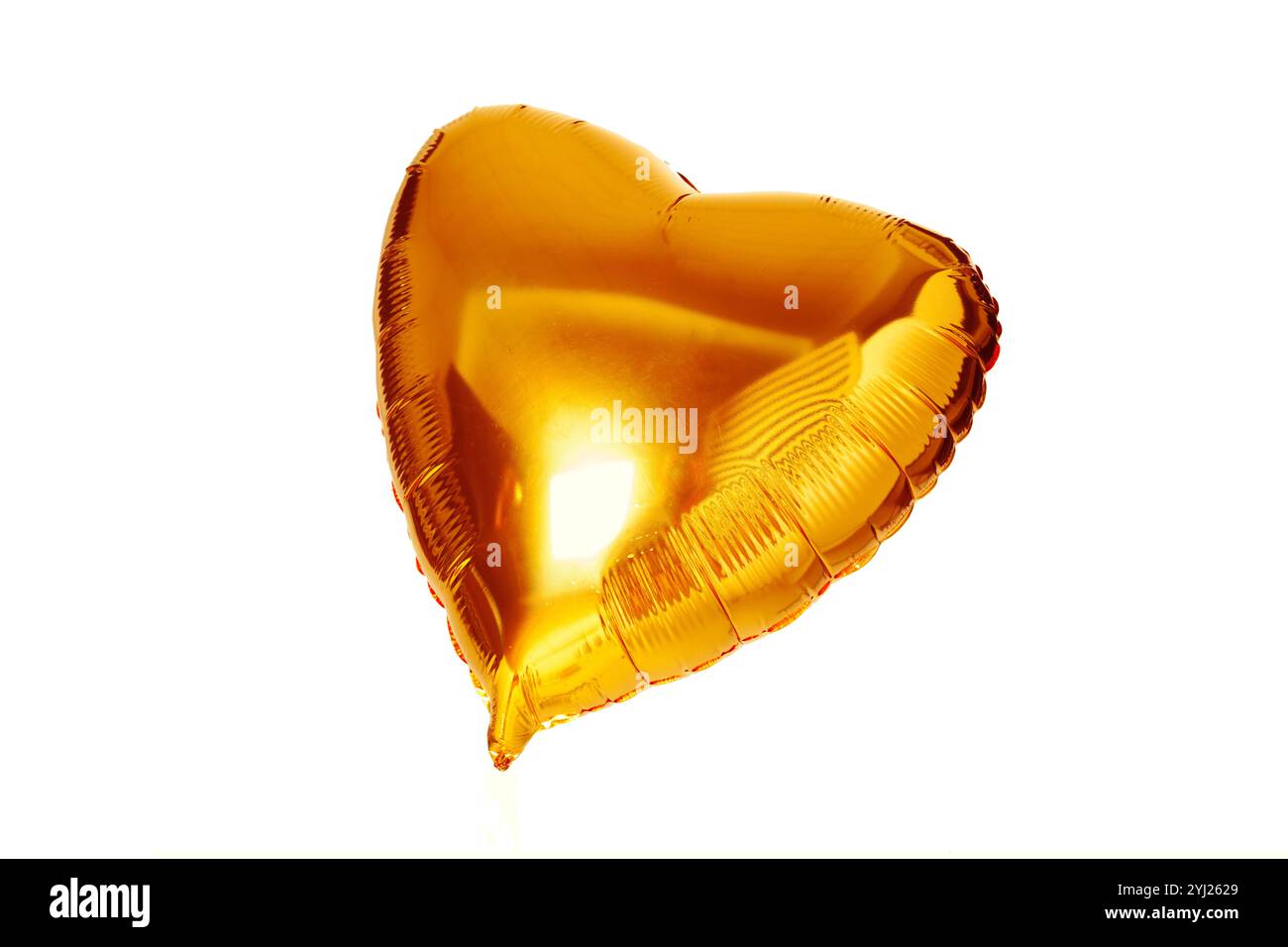 gold big heart metallic balloon isolated on white Stock Photo - Alamy