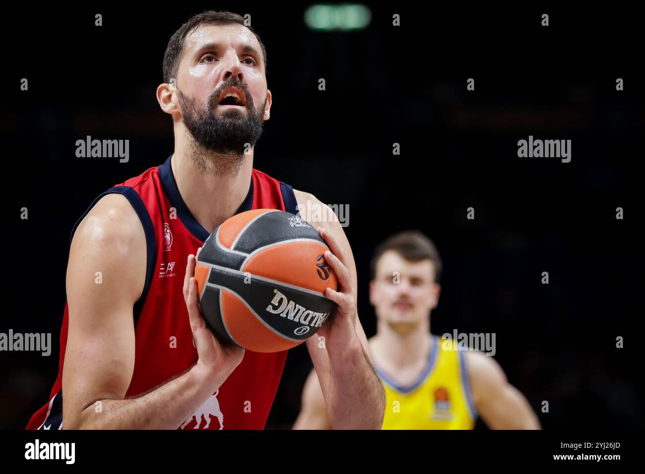 Berlin, Germany. 12th Nov, 2024. Nikola Mirotic (33) of EA7 Emporio Armani Milano seen during the Turkish Airlines EuroLeague basketball match between ALBA Berlin and EA7 Emporio Armani Milano at the Uber Arena in Berlin. Credit: Gonzales Photo/Alamy Live News Stock Photo