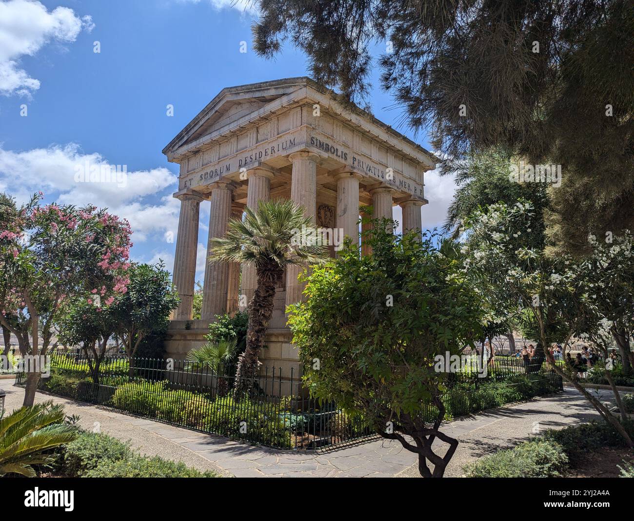 Historic building in a garden at the Lower Barrakka Gardens inValletta, Malta. - Smartphone Captured Stock Image