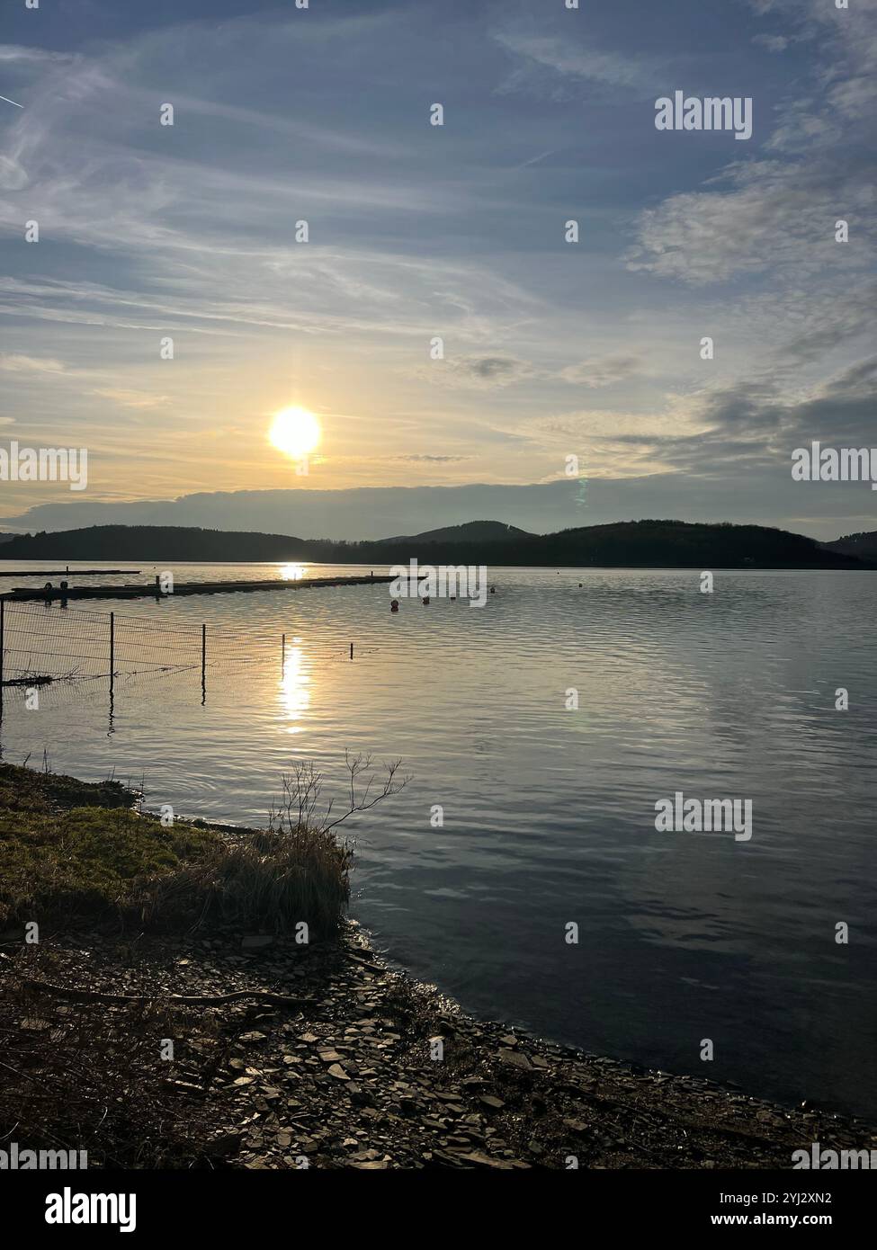 Sunset at a lake, Biggesee, Waldenburgerbucht, Attendorn, Sauerland, NRW - Smartphone Captured Stock Image