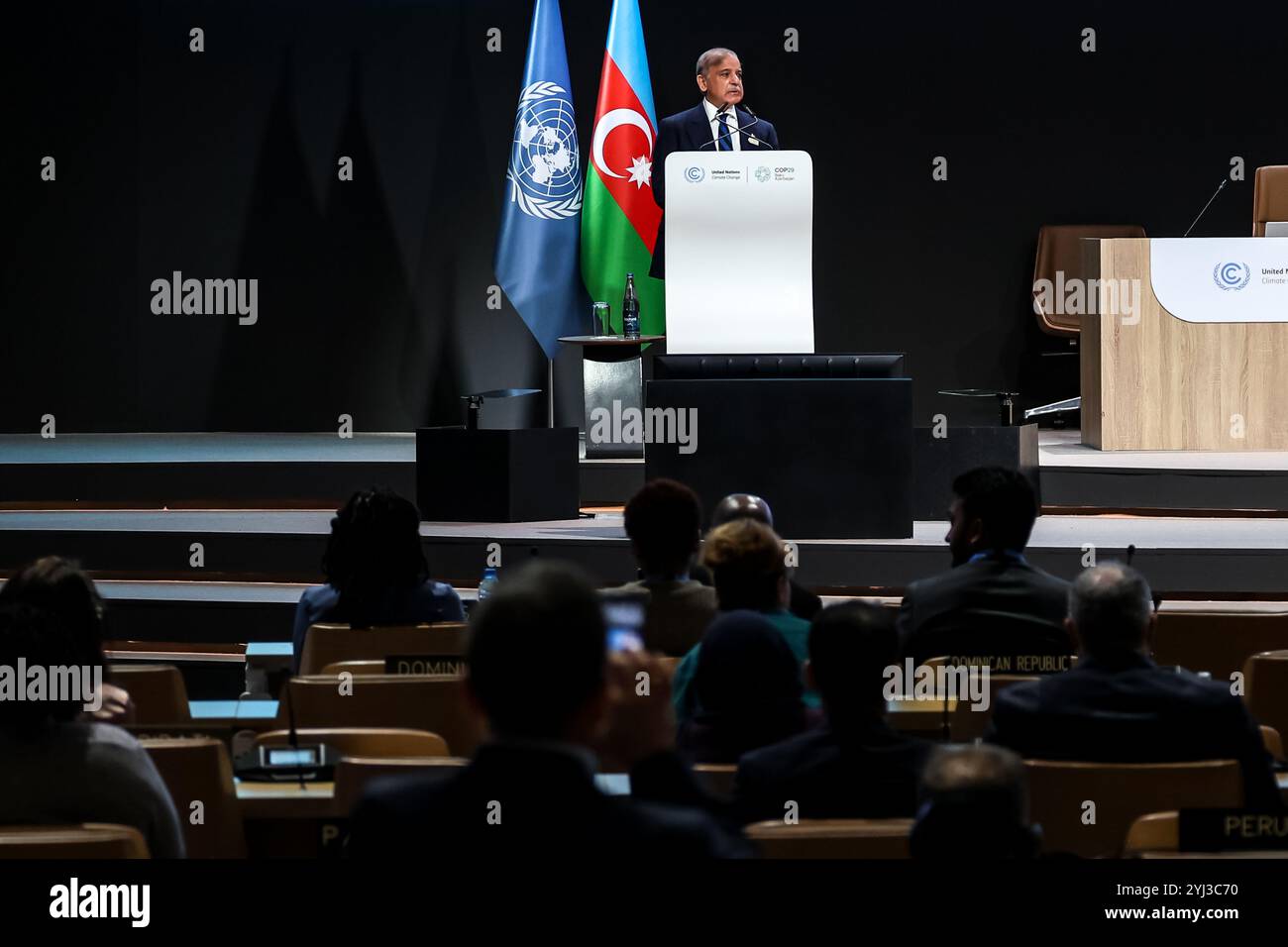 Baku, Azerbaijan. 13th Nov, 2024. Mian Muhammad Shehbaz Sharif, Prime Minister of Pakistan speaks during First Part of the High-Level Segment of United Nations Climate Change Conference in Nizami Plenary Room during COP29, an event held by UNFCCC in Baku Olympic Stadium. COP29, running from November 11-22 focuses on carbon offset and sustainability and mitigation funding. (Photo by Dominika Zarzycka/SOPA Images/Sipa USA) Credit: Sipa USA/Alamy Live News Stock Photo