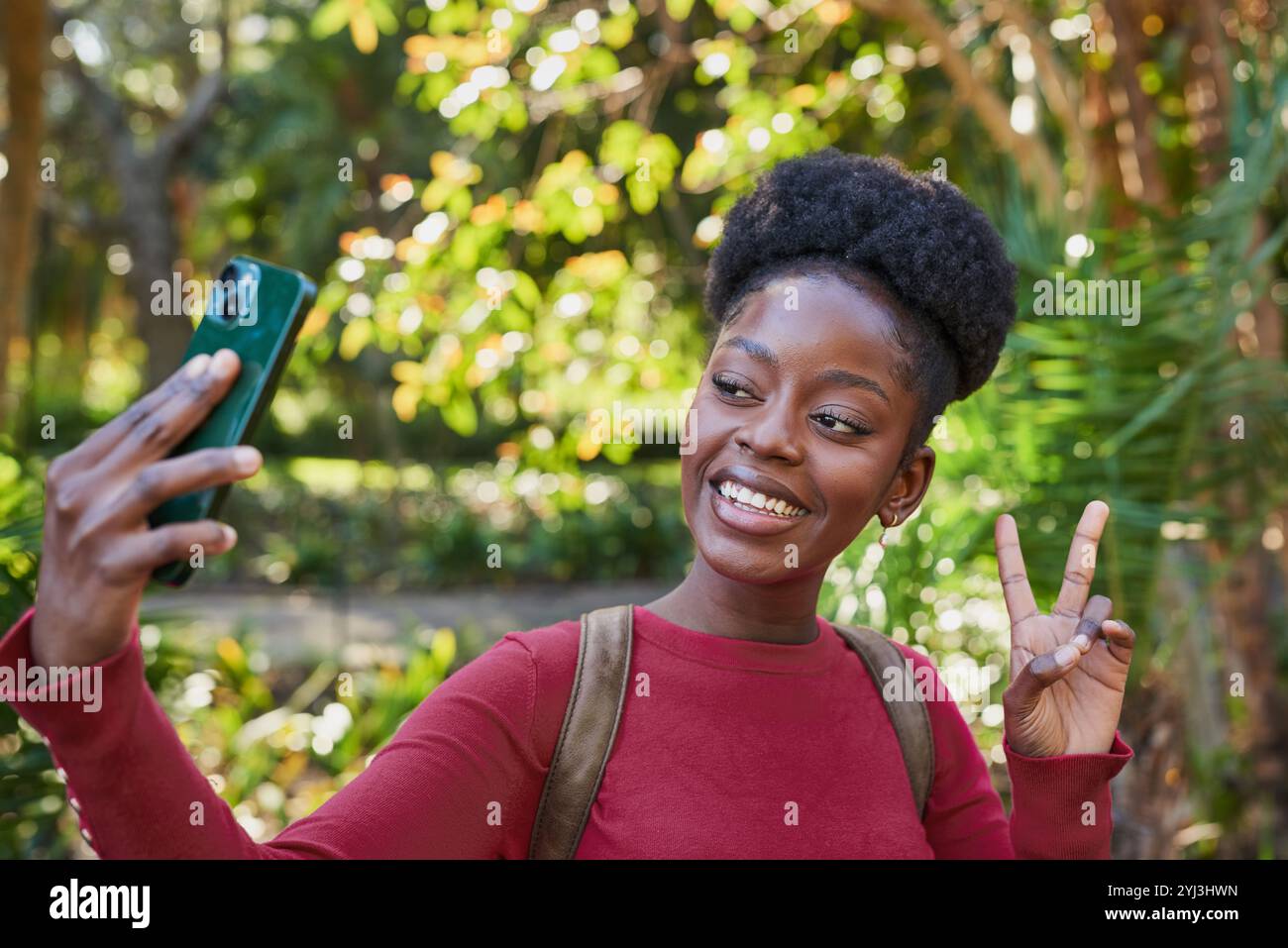 Young black woman vibrant hi-res stock photography and images - Alamy