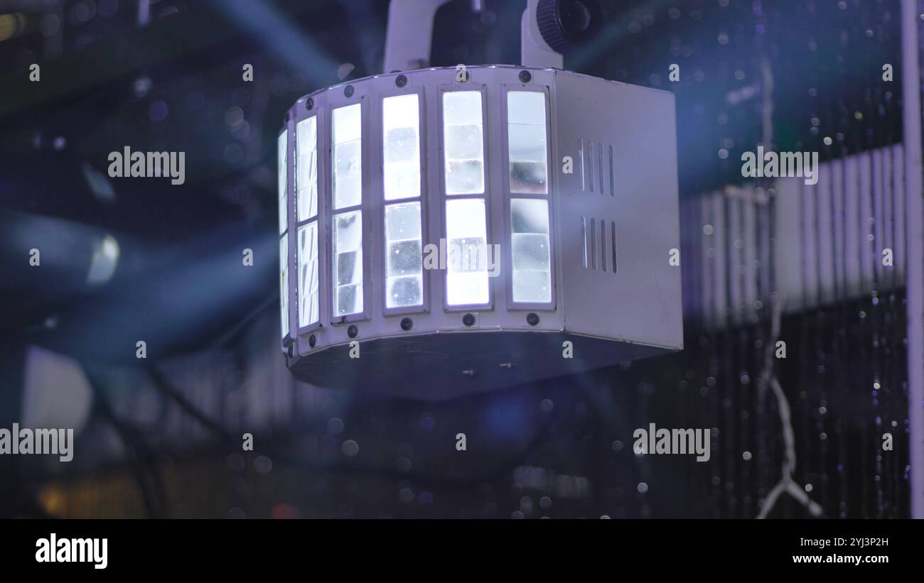 Professional stage lighting equipment creates vibrant atmosphere with light beams and spotlights during a show Stock Photo